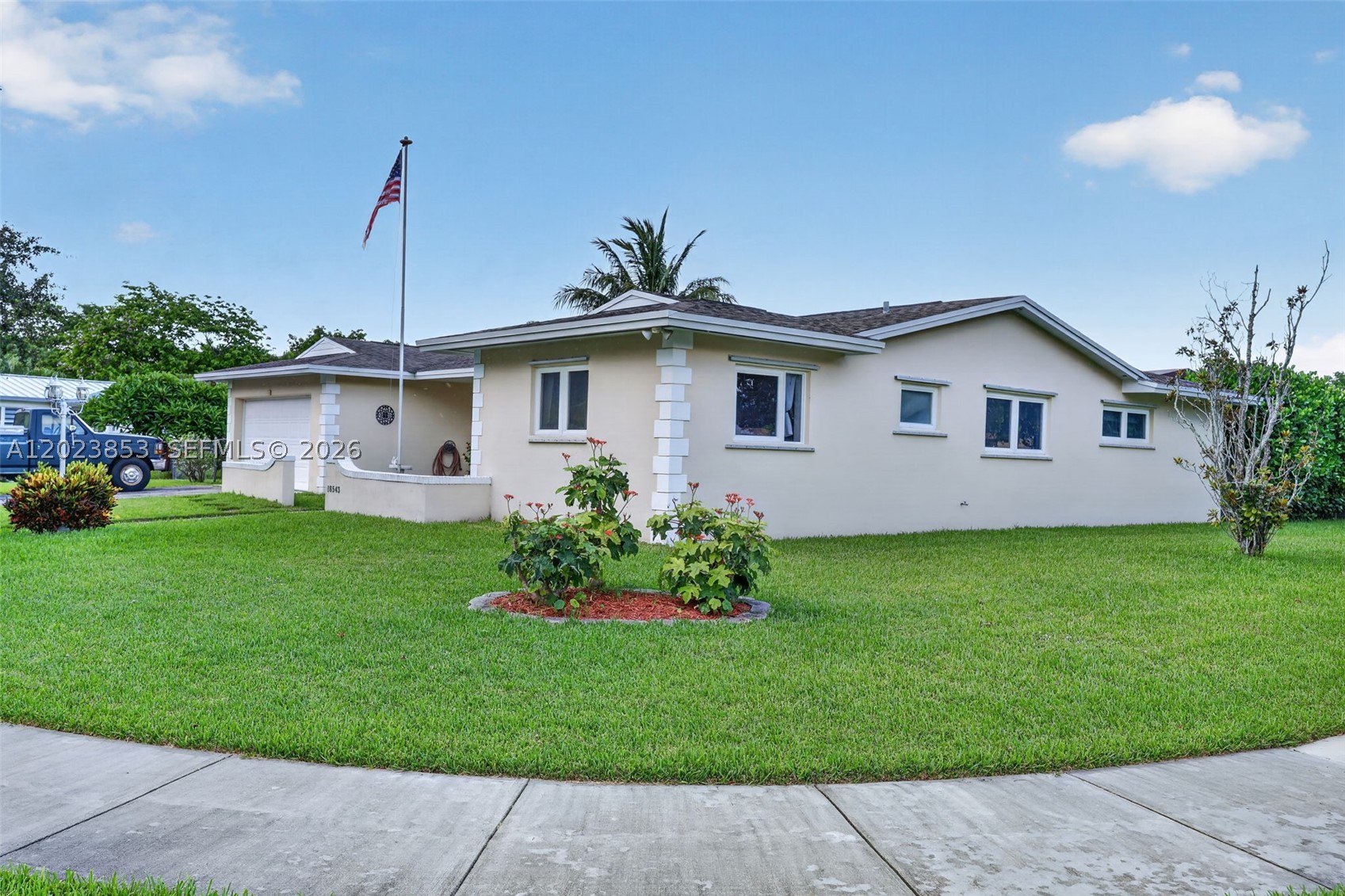 Welcome to 18543 SW 91st Ave and this 1 story ranch style home on an oversize corner 12,024 sq ft lot with 2 car garage & 3 beds, 2 baths. Enjoy this bright home w/ split floor plan, spacious bedrooms, smooth ceilings, Brand New Primary bath (2026), neutral tile in main areas, Laminate in bedrooms. Granite and Real Wood Cabinets in Kitchen which has large breakfast area or office too. Gas service for your stove/oven/dryer/water heater. Have peace of mind w/ the Architectural shingle roof with long term warranty, NO HOA. Well located in Cutler Bay near shopping, dining, Publix, Target, US1, Turnpike, public transportation, close to Palmetto Bay border. Whispering Pines Park / Lakes by the Bay park nearby, 1 mile to college prep Palmer Trinity School and A rated Schools, Black Point Marina. Conv/FHA/VA Financing Available.