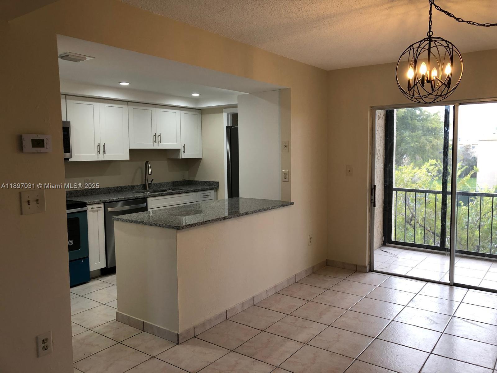 Largest 3rd-floor apartment featuring a beautifully remodeled kitchen and bathrooms, offering modern finishes and functionality. Seller Will Pay Assessment In Full at time of closing.