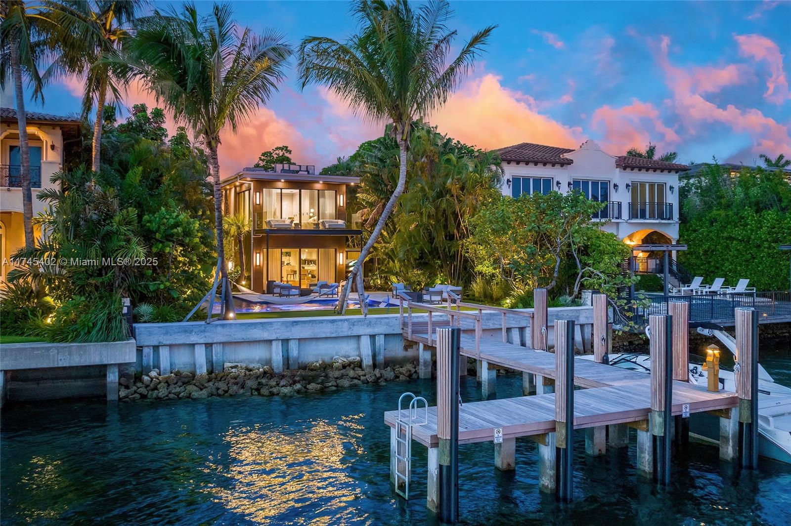 Experience the Height of Waterfront Luxury. Nestled on the prestigious Biscayne Bay, this fully reimagined 4-bedroom, 4-bathroom estate epitomizes modern luxury. Designed for those who crave elegance and breathtaking views, this masterpiece offers an unparalleled panorama of Miami’s dazzling skyline. Every inch of this residence has been meticulously curated, featuring an open-concept layout bathed in natural light, soaring ceilings, and exquisite high-end finishes. Step outside to a private oasis and private Dock, large enough for a 60 ft. yacht & overlooking pristine waterfront, lush tropical landscaping, and tranquil water features create the perfect setting for relaxation or entertaining. More than a home, this is a statement of refined living. Contact us today for a private showing.