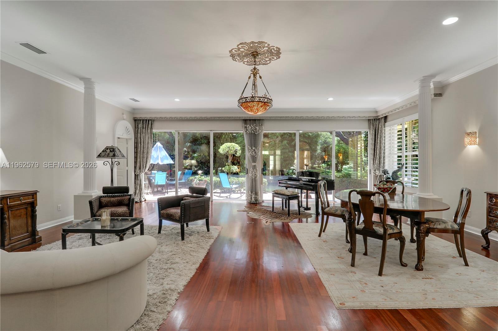 Third bedroom converted to stunning library off living room. Harmonious blend of updated home and lush garden on a wonderful cul-de-sac street. Many amenities include, Plantation shutters, crown moldings, updated light fixtures,  top of the line materials and so much more.   Custom cabinetry and epoxy floor enhance the garage.  24 hour manned gated community with community pool. Sought after location close to Gardens Mall, Beaches and so much more.  Call for​​‌​​​​‌​‌​​​‌‌​​​‌‌‌​​‌​​‌‌​​​​ appointment.