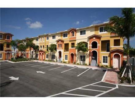 Welcome to this beautifully updated townhouse nestled within a secure, gated community in one of South Florida’s most sought-after locations. Featuring an open and airy floor plan, the home has been thoughtfully refreshed with a new water heater, modernized kitchen, new staircase, and fresh paint throughout — move-in ready from day one. 
Enjoy your private balcony, perfect for morning coffee or evening relaxation, along with the convenience of an in-unit washer and dryer. One deeded parking and one available space are included. The well-maintained community offers a sparkling pool and children’s play area for residents to enjoy.
Perfectly positioned just minutes from the Hallandale Beach Beachwalk, Gulfstream Park, Aventura Mall, premier dining and shopping, FLL Airport, and easy access to I-95 — everything South Florida has to offer is right at your doorstep.
Don’t miss this incredible opportunity — the seller (original owner) is motivated and ready to help the buyer with the closing costs up to $10,000.
City of Hallandale Beach and HOA approval required prior to closing. Buyers must meet Community Redevelopment Agency (CRA) program eligibility guidelines.