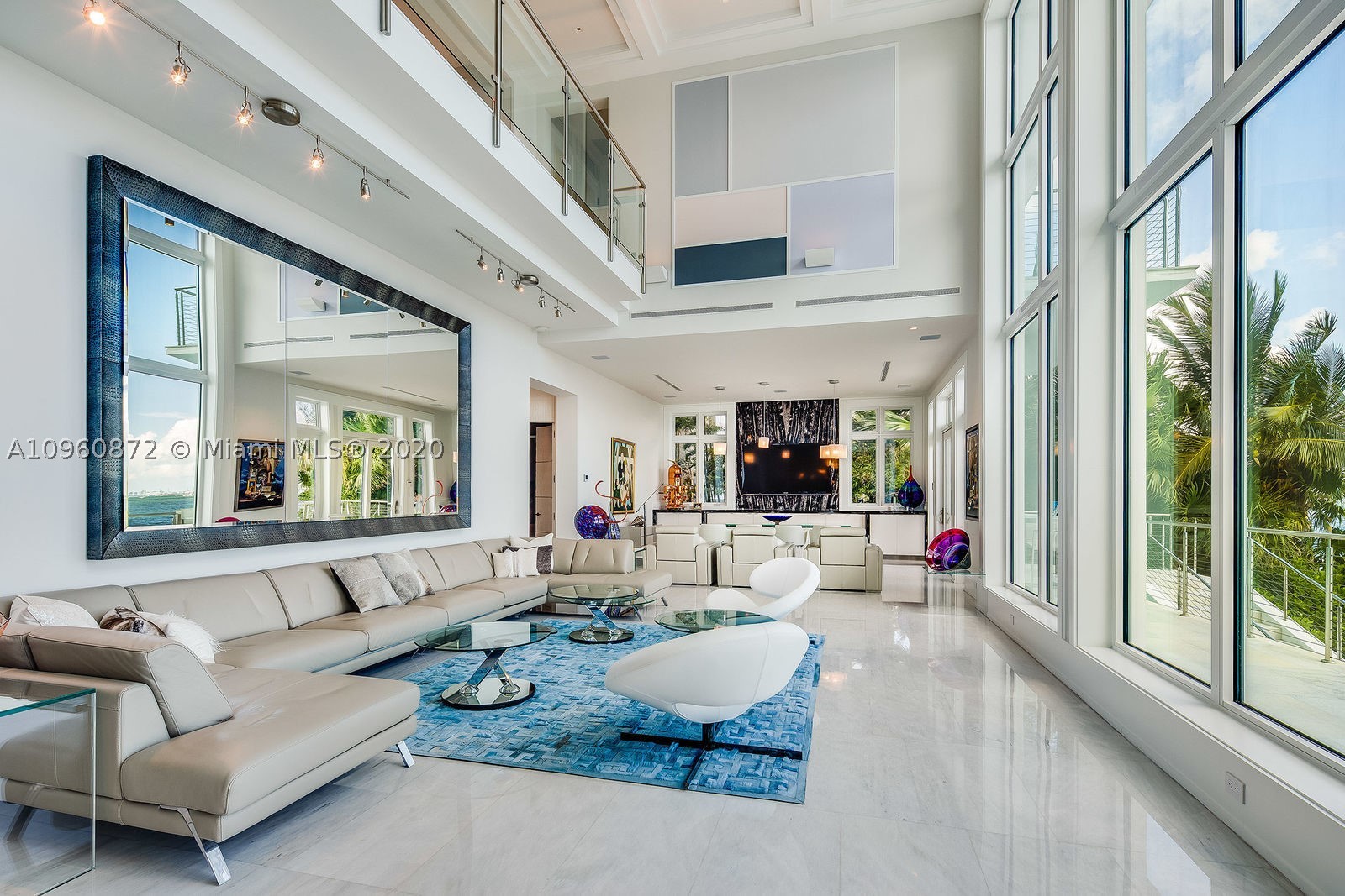 No expense was spared on this beautiful custom-built modern home, designed by famed architect Jorge Hernandez for a prime location with 100 feet of frontage directly on Biscayne Bay. With stunning views of downtown Miami and Key Biscayne, the wonderful open design concept allows for both ease of living and great spaces for entertaining, taking full advantage of the magnificent location. The home also comes with a theatre, summer kitchen, saltwater pool, and private dock and boatlift.