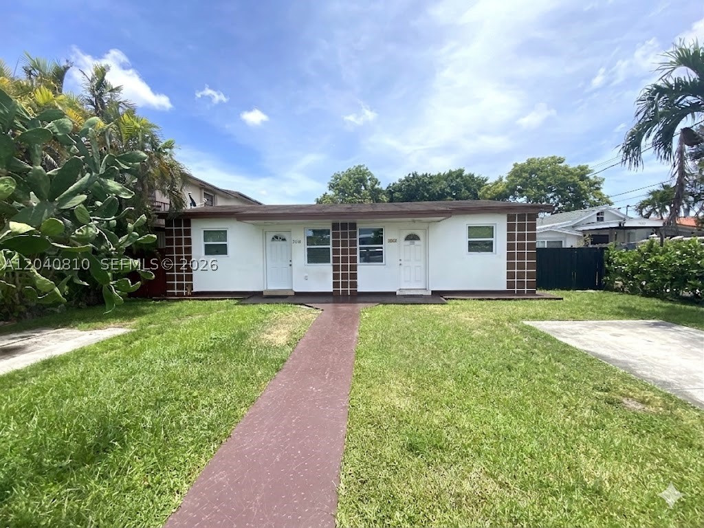 Unlock the potential of this multi-family property featuring 2BR/1BA units equipped with newer windows and private outdoor spaces for each tenant.  The property sits on an oversized lot and includes a substantial concrete storage structure at the rear offering endless possibilities.  The property offers on-site parking and a magnificient mature mango tree.  Located in the Allapattah neighborhood, just minutes from the arts and culture of Wynwood and the luxury of the Miami Design District, this property sits in one of Miami's most exciting growth corridors.  The area is experiencing significant redevelopment and transformation into a vibrant, transit-oriented destination blending art, culture, residential living, and economic growth.  Whether you're an investor seeking long-term appreciation, an owner-occupant looking to offset expenses with rental income, or a visionary ready to capitalize on the neighborhood's momentum, this property presents a unique opportunity to secure a foothold in a thriving market.  Opportunities like this are becoming increasingly difficult to find, secure your investment in Miami's future today.
