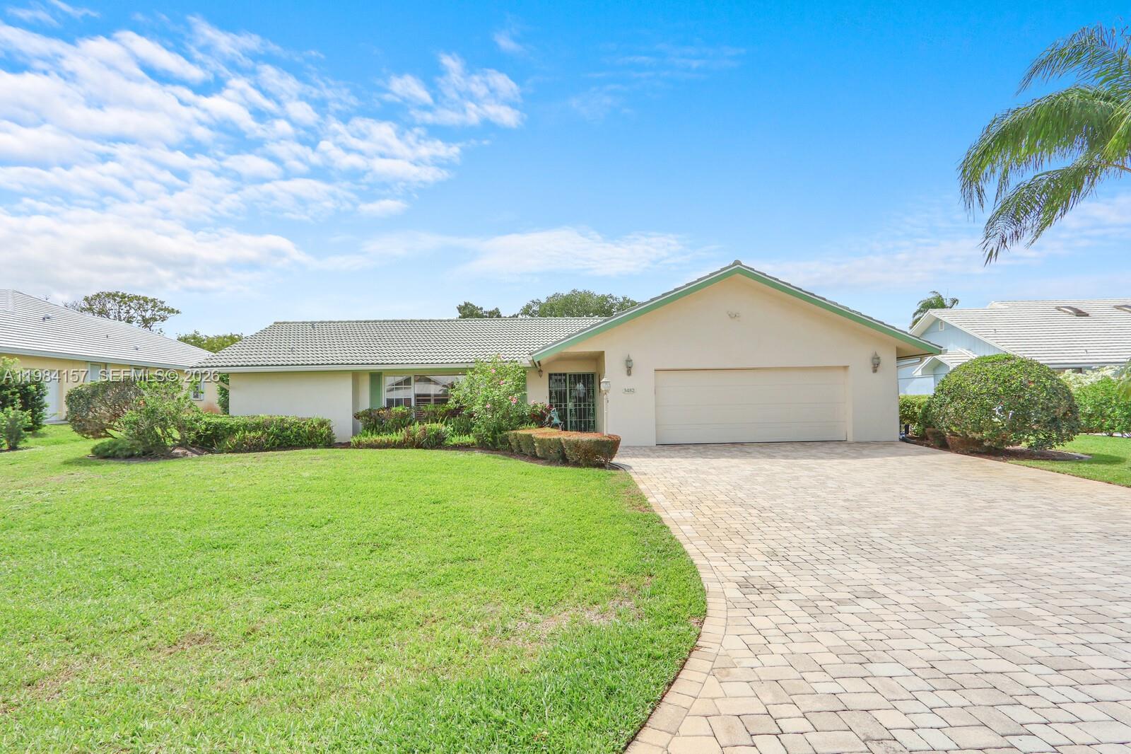 Full Florida living as this home is situated so close to Parks and allows the ability to Bike to the Waterfront. Live the Stuart Lifestyle- Voted Best Small Beachtown! 
Beautifully maintained lakeview pool home in the sought-after Yacht & Country Club of Stuart.
This single story 3 bedroom, 2.5 bath, CBS home offers a highly desirable split floor plan featuring two spacious owner’s suites each with private en-suite baths and walk-in closets, all perfect for hosting guests or multigenerational living. Both suites open directly to the pool and include private en-suite baths, ample closet space and with one featuring a large soaking tub and separate shower for a true spa/retreat like feel.
Light-filled living and dining areas flow effortlessly into an additional flexible space ideal for a home office, den, or game room. Recent updates include upgraded closets, fresh exterior paint, and a refreshed pool, which making this home move-in ready.
Just outside your screened-in pool enjoy the peaceful lake view on this quiet interior lot. Located within a gated community with 24 hour security, low HOA, and optional club membership.
Enjoy unbeatable convenience- so close  to Sandsprit Park, local fitness amenities, or bike to Manatee Pocket’s popular waterfront restaurants and marinas, plus all that Stuart has to offer- endless restaurants and shops. 
Priced to stand out in one of Stuart’s premier communities.
Contact the Membership Office for YCCS membership details.