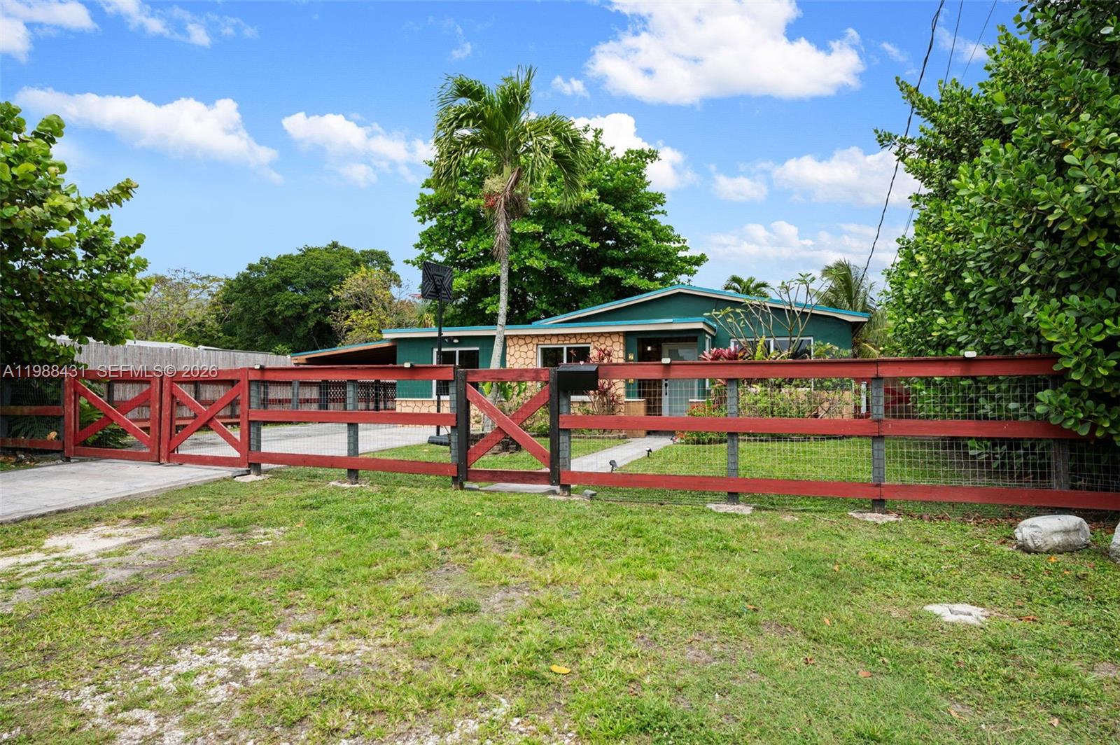 Charming 3-bedroom, 2-bath Single Family Home tucked away at the end of a quiet no-thru street, this home offers the privacy you’ve been looking for—with only one direct neighbor, serene canal views along the side and rear, and no back neighbors. Enjoy ample front parking and a long driveway leading to a covered carport. No HOA, Pets welcome! Designed for both relaxation & entertaining, features laminate wood-like flooring throughout, a washer & dryer, and a covered patio deck overlooking a tranquil pond. The large backyard is perfect for gatherings, complete with an outdoor seating area and a one-of-a-kind two-story clubhouse/fort with a spa on the lower level—your own private oasis to unwind or host guests.