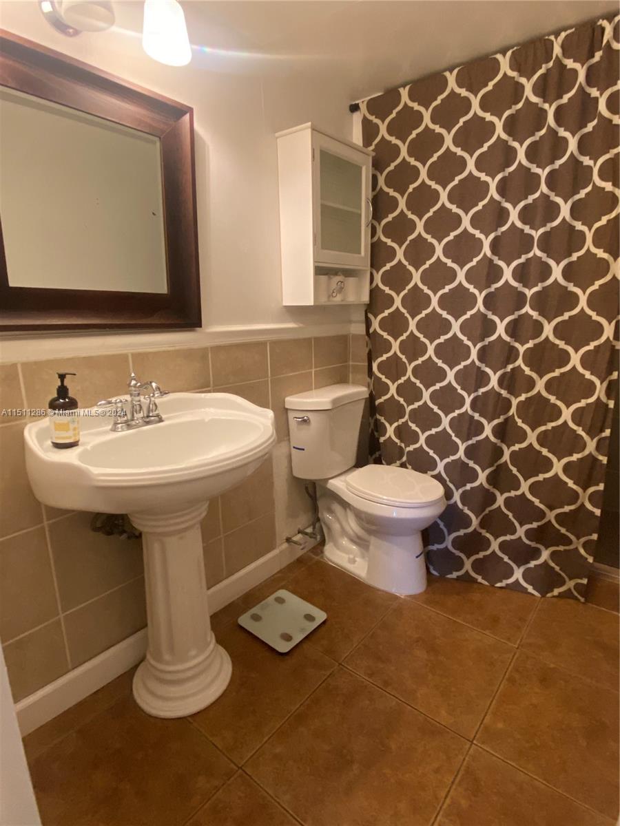 WOODSIDE APTS CONDO - Residential Lease