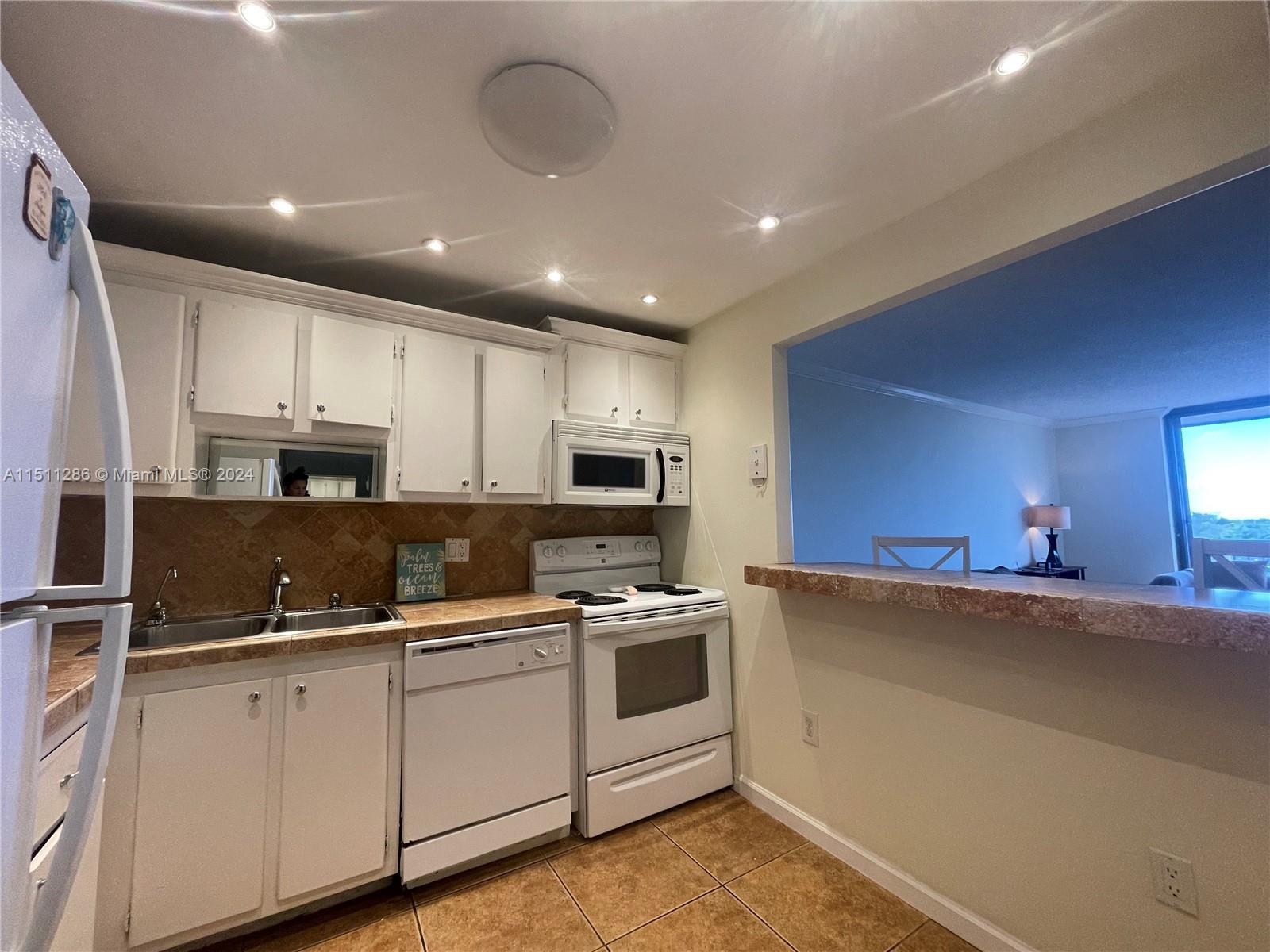 WOODSIDE APTS CONDO - Residential Lease