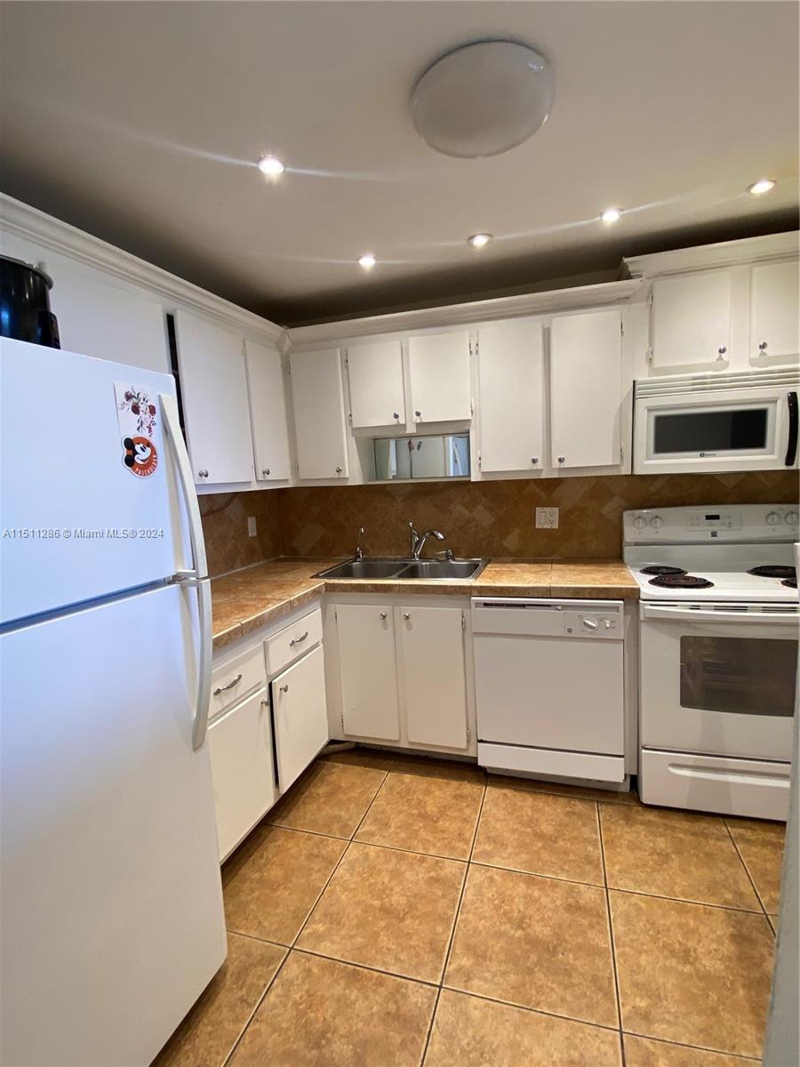 WOODSIDE APTS CONDO - Residential Lease
