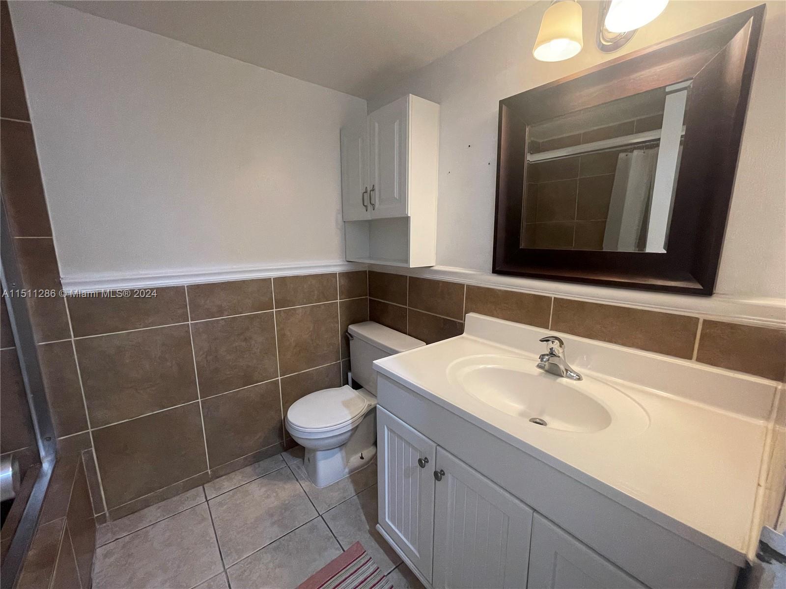 WOODSIDE APTS CONDO - Residential Lease