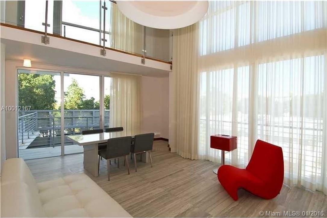Luxury & Style at the ILONA Lofts, located in the heart of SOFI. Unique loft living w/high-end finishes, 2-Story Split-level, 20' high floor-to-ceiling windows. Stainless steel & Glass stairwell. Travertine marble & natural walnut hardwood floors. Beautiful Custom kitchen, bath suite for a King & Queen w/walnut dream closets, master bathroom w/floor to wall marble, Robern mirror, Duravit vanity & Axor fixtures. Furnished outdoor terrace space that has #MiamiCool all over it and w/2 parking spaces!