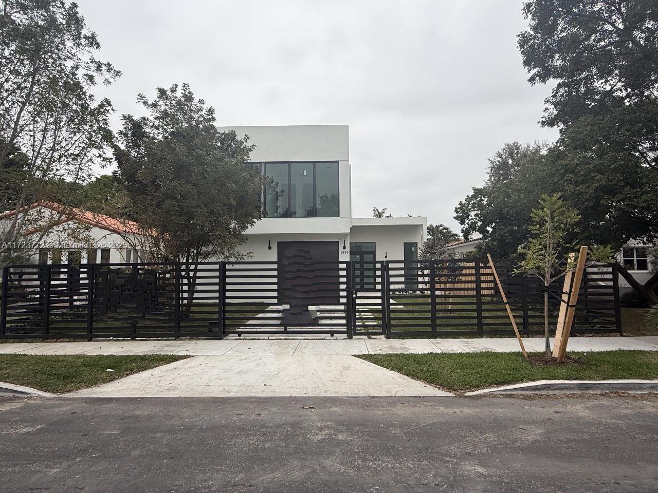 3,590 sqft New Two-story Single Family Home in Prime location (Quiet street in Shenandoah with 5 new constructions under development), 5 minutes away from Brickell, 3 blocks away from The Roads, 10 mins away from Coconut Grove! Brand new construction with an open floor plan, Double-door entry, 5 beds, 4.5 baths. Open floorplan with Dining & Great Rooms. Features a modern design, natural light in all rooms, Master bath with Free-standing Tub & Large Shower, high-end finishes, modern appliances with double oven and double large refrigerators, Custom-Designed European Kitchen, Calacatta quartz countertop with waterfall, walk-in pantry, 10" ceiling height, all doors are 8' height. Spacious bedrooms (one in-suite bed on the 1st floor), pool, covered terrace w/ summer kitchen. Ready for 3/31/25