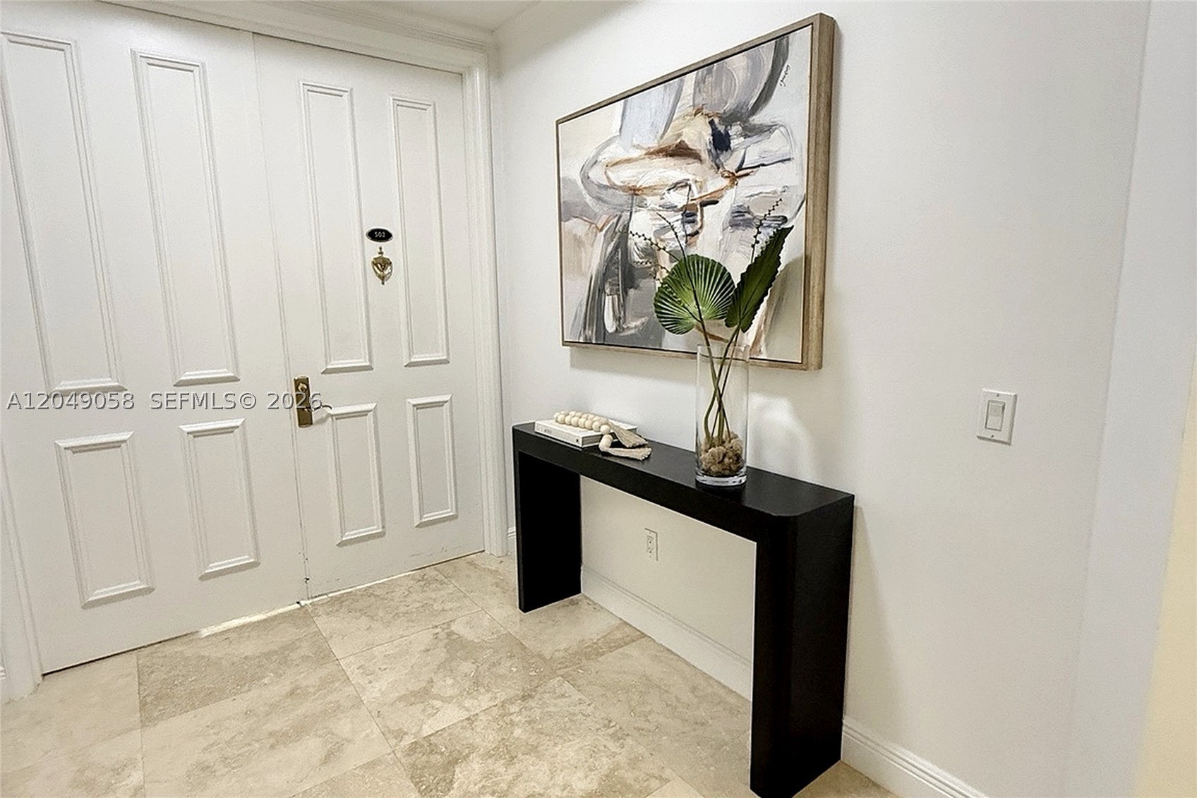 Your “home in the sky” in the exclusive, guard-gated community of Deering Bay. Perfectly positioned in the coveted Milano Building 02 line, this residence showcases views of the city skyline, golf course and resort-style pool. This light-filled, impeccably maintained home offers three spacious ensuite bedrooms plus a guest bath, elegant marble floors in the main living areas and carpeting in the bedrooms, a private elevator entry foyer and soaring 10-foot ceilings that enhance the sense of space and luxury. The beautifully appointed granite kitchen with center island and Thermador appliances flows seamlessly into expansive living and dining areas, ideal for both everyday living and sophisticated entertaining. Recent upgrades include new hurricane IMPACT DOORS (2024) and impact windows, providing both style and peace of mind. Milano Deering Bay, delivers a refined lifestyle with a gracious lobby, social room, resort-style pool and BBQ area, fitness center and hotel-style guest suite. Two assigned parking spaces (#34 & #35), golf cart space (#10) and storage unit (#25) included. Boat slip available separately; owner will assist. Quarterly fees: Milano $8,589.91 and Master Association $781.19. Assessment information available upon request.