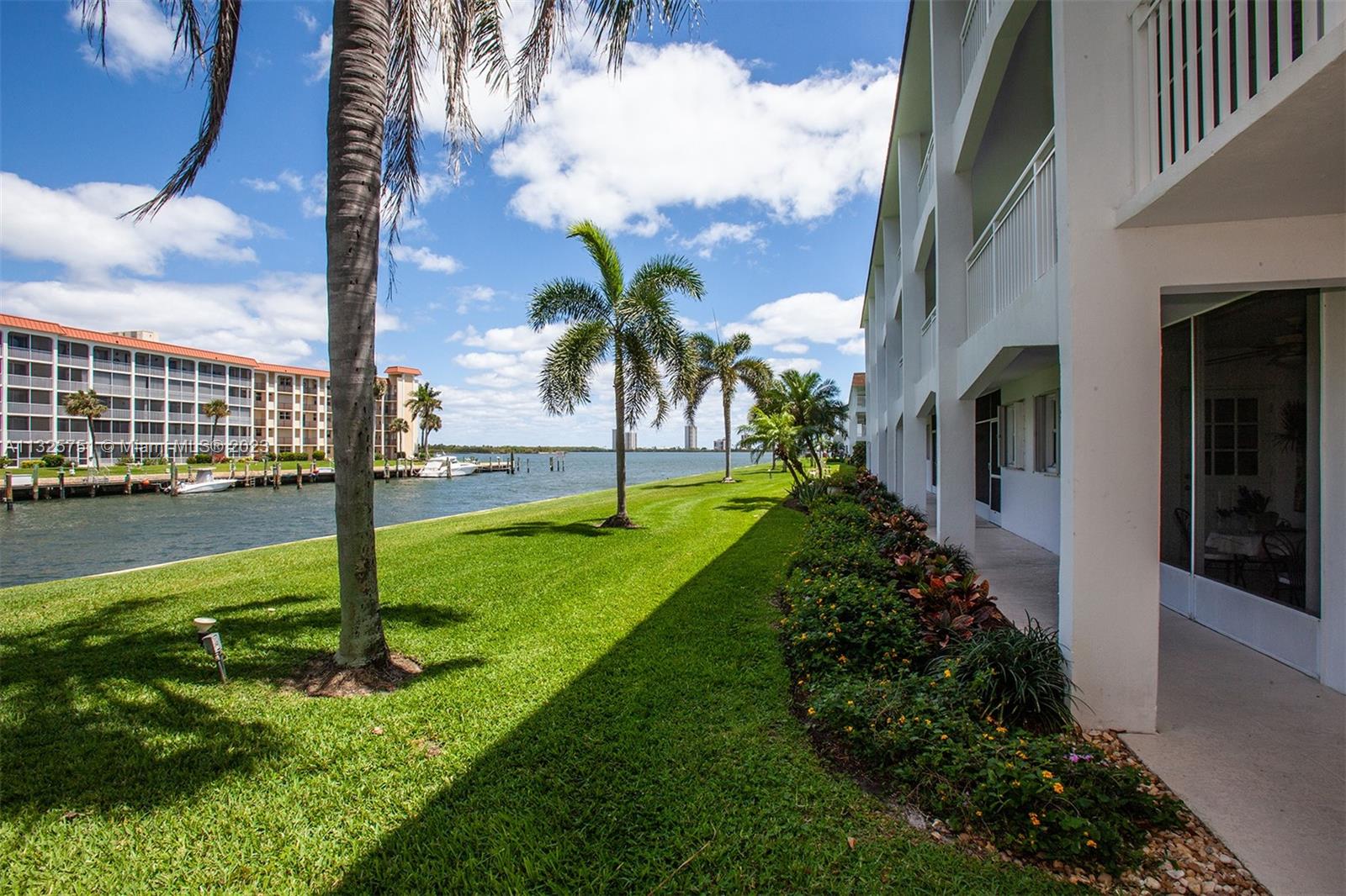 Trendy waterfront condo on the first floor feels like a house situated directly on the intracoastal where it meets the Earman River. Corner unit, price reduced for this estate sale.
Substantially remodeled corner unit with 2 bedrooms, 2 full baths. 
Because this is a corner unit, there are extra windows in living room and bedrooms, bringing in the south Florida breezes with cross ventilation in every room. 
Community Pool, Clubhouse and Fitness Center. Brand new central A/C compressor and A/C handler. Updated Bathrooms and kitchen counters. This property is located outside the flood zone, therefore, NO flood insurance is required. Building roof is brand new as of Dec-2022.
At least one owner must be a minimum of 55 years of age.  NO Leasing allowed, no investors please.
