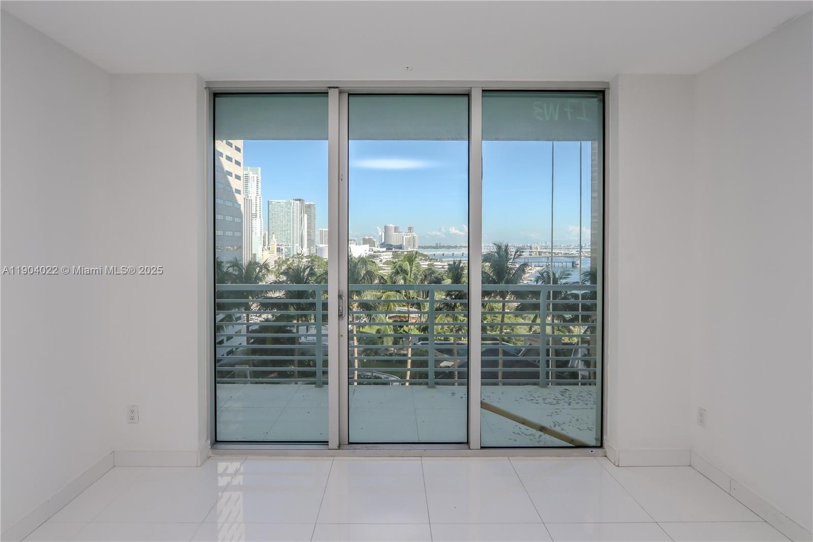 Beautiful 2 Bedroom / 2 Bathroom Split-Plan Condo featuring direct views of Bayfront Park, Biscayne Bay, and the Miami Skyline. This residence offers modern porcelain tile floors throughout, a gourmet kitchen with wood cabinetry, granite countertops, and stainless-steel appliances, plus elegant marble bathroom counters. Enjoy resort-style living with building amenities that include two swimming pools, Jacuzzi, two fitness centers, sauna, party rooms, convenience store, 24-hour security, valet, and concierge service.
Prime downtown location—within close distance to Kaseya Center, Adrienne Arsht Center, and Brickell City Centre, and minutes to Key Biscayne, South Beach, Coconut Grove, Coral Gables, Wynwood, the Design District, and Miami International Airport.