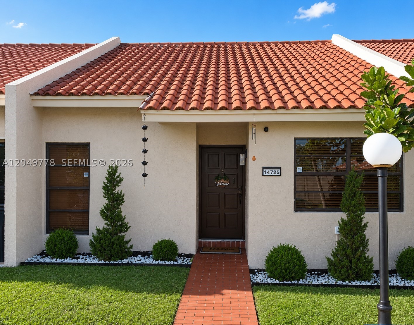 This updated 3-bedroom, 2-bathroom townhome features renovated walk-in showers with glass doors, an open-concept kitchen with a removed dividing wall, and a fully fenced backyard with a new wooden fence and covered terrace with an aluminum roof. The home includes a new Samsung washer and dryer, an HVAC system updated in 2021, and recent replacements of the front fascia board and roof flashing. The roof is approximately 24 years old.