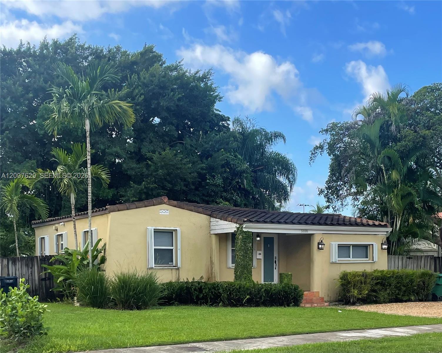 Welcome to this beautifully maintained 3-bedroom, 2 bath home located two blocks west of Coral Gables.  Sought after neighborhood with top-rated schools. Perfect blend of comfort, convenience and value.  Open concept white kitchen with stainless steel appliances opening to dining/living area.  Split bedroom layout. Remodeled bathrooms and beautiful wood floors.  Newer roof, updated A/C unit, and windows equipped with hurricane accordion shutters.  Large backyard features a concrete patio just off the kitchen, perfect for entertaining and outdoor dining. Centrally located near the University of Miami, major highways and premier shopping and dining destinations. Very easy to show.  Bring your buyers.  Will not last.  Priced to sell fast.