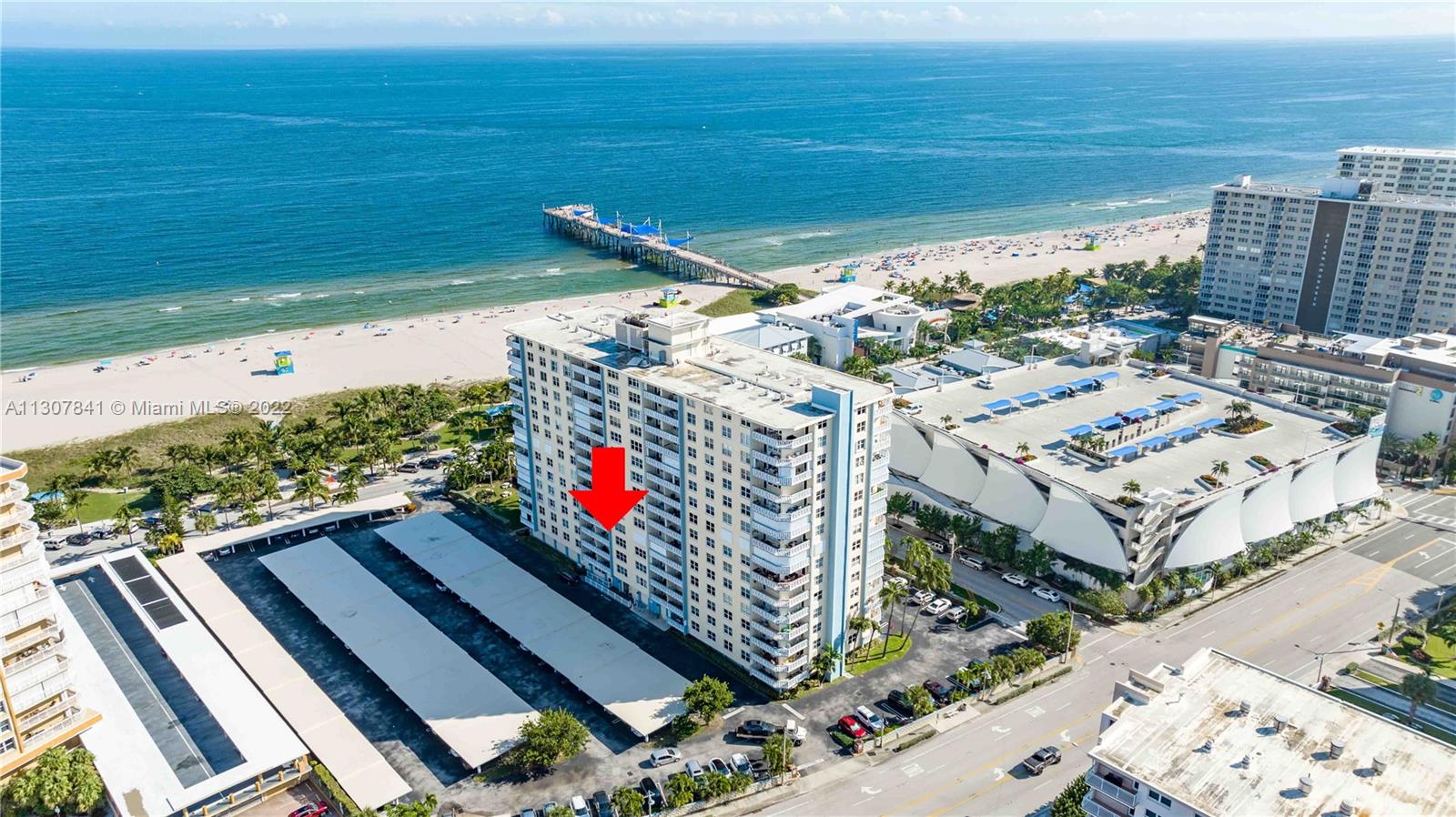 AT THE BEACH, OCEAN VIEWS, 2 BEDROOMS, 2 BATHROOMS UPDATED, 1,200 SQUARE FT, LOW MAINTENANCE $584 PER MONTH, HURRICANE IMPACT WINDOWS & DOOR UPGRADED, COVERED PARKING, JUST NORTH OF ATLANTIC BY THE POMPANO BEACH FISHING PIER VILLAGE INCLUDING UPSCALE WATERFRONT RESTAURANT, RETAIL SHOPPING, ENTERTAINMENT, FISHING PIER, PARKING. BUILDING WELL MAINTAINED & MANAGED WITH RESERVES & HEALTHY FINANCIAL STATEMENTS.