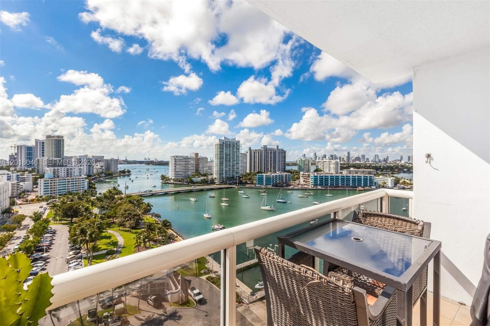 Rare South East corner unit delivers 2 bedrooms, 2 balconies and 2 views.  Start your day facing East over South Beach for sunrise + ocean views, then end your day with sparkling bay and downtown views over the intracoastal facing South West.   White kitchen with granite, marble baths, 2025 AC, one garage space, and great layout.   This unit is flooded with sunlight all day and ideally located in a vibrant neighborhood.  Downstairs, stroll the bay walk at Sunset Harbour Yacht Club on your way to popular dining, fitness and shopping boutiques.   Check out the new water taxi to Edgewater  - this location is a prime spot close to the activity of South Beach without the crowds or tourists.   Sunset Harbour South is nearing completion of a $12 million refresh and re-certifaction (November 2026 completion date) - Paid in full by Seller.   HOA fees even went down 6% last year.    New gym to debut in late summer 2026, and a new pool and resort deck is in progress.  Doorman, valet, work-from home clubhouse, sauna, electic car changing, bike + paddle board storage + available storage add to the appeal.  Incredible closed comps to share when you tour and fall in love at Sunset Harbour