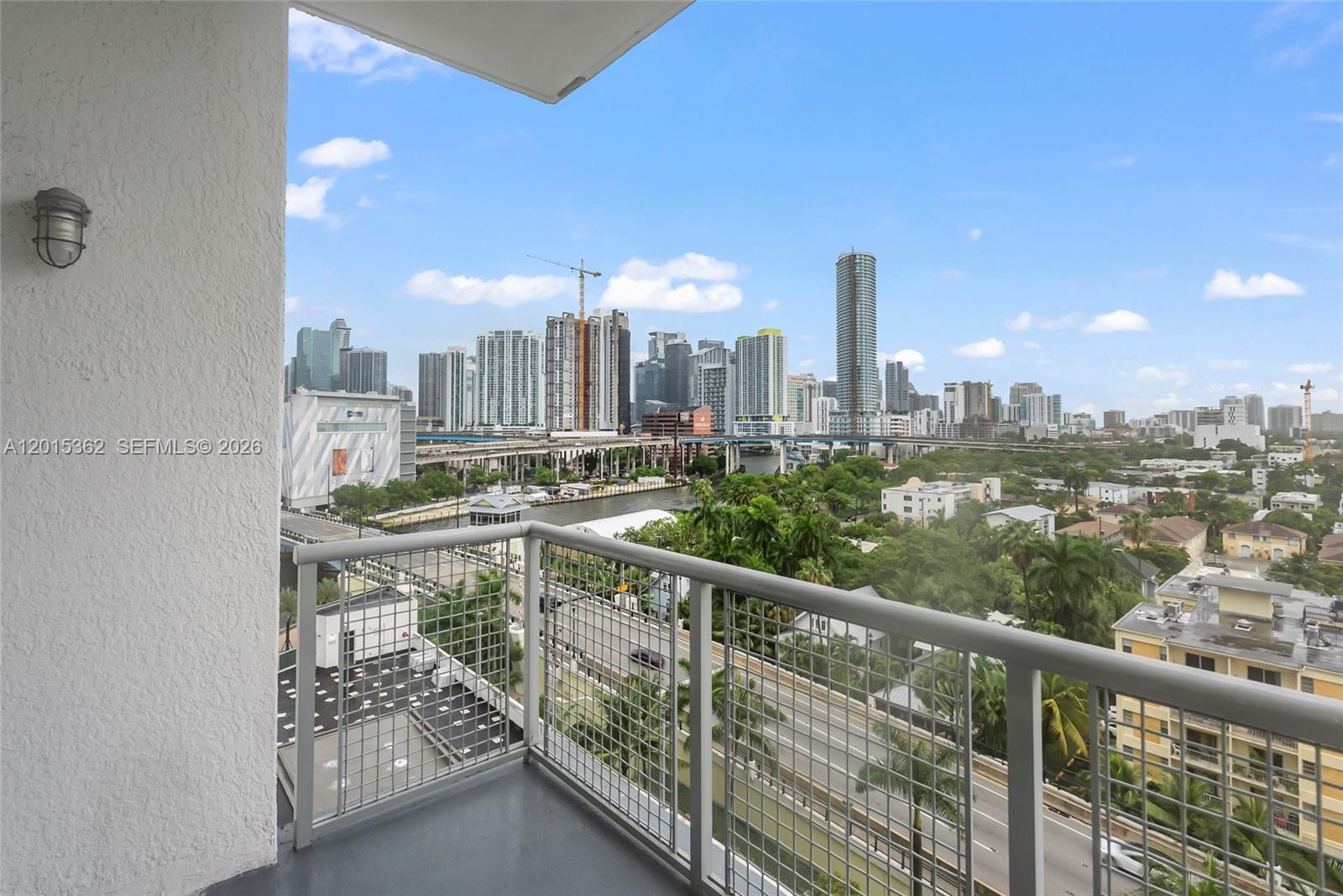 Modern 2-bedroom, 2-bath loft-style residence in NeoLofts offering open-concept living, polished concrete floors, and expansive windows with Miami River and city views. Flexible layout allows for multiple living configurations, including a defined primary suite and versatile secondary space ideal for bedroom, office, or den.  The kitchen features contemporary cabinetry, stainless steel appliances, and clean, modern finishes. Well-maintained and move-in ready.

Full-service building amenities include pool, fitness center, sauna, tennis courts, business center, dog park, and 24-hour concierge.  Located along the Miami River just minutes to Brickell, Downtown, dining, and major highways.

Unit can be delivered vacant July 1 for immediate occupancy or leasing.