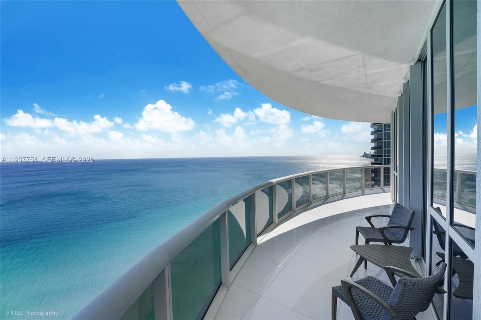 Unit 2701 is a refined 3-bedroom, 3.5-bath residence set high above the coastline, offering unobstructed ocean, city, and Intracoastal views through expansive floor-to-ceiling glass. Thoughtfully styled, the home showcases curated design details that reflect modern sophistication throughout.

The kitchen has been updated to an open floor plan, seamlessly integrating with the living and dining areas—ideal for both entertaining and everyday living.