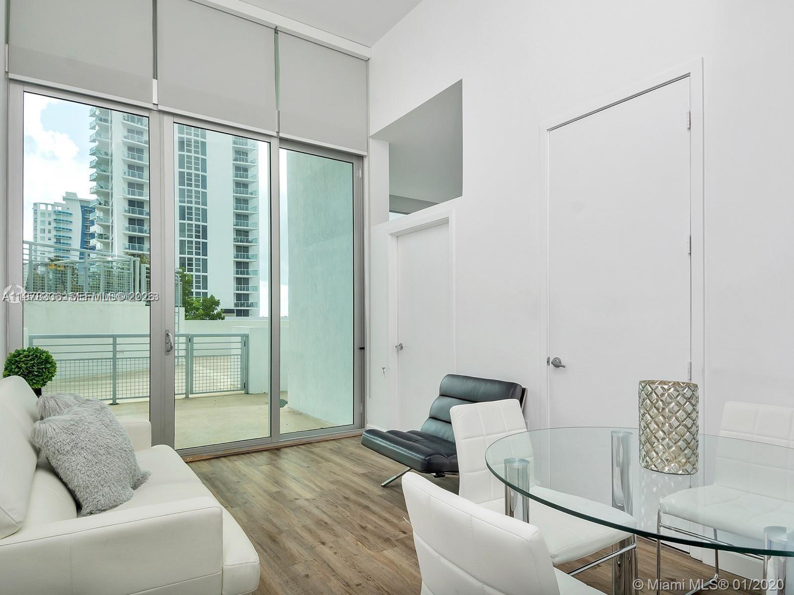 Charming 1Bed/1Bath Plus a Den, very high ceilings, bay views and a large terrace. Kitchen has stainless steel appliances and granite countertop. Washer/ Dryer in unit. One assigned Parking space included. Building amenities include pool with pool deck and jacuzzi, sauna room & gym. Close to restaurants ,supermarkets, shops and public transportation, minutes from Midtown, Downtown And Wynwood.