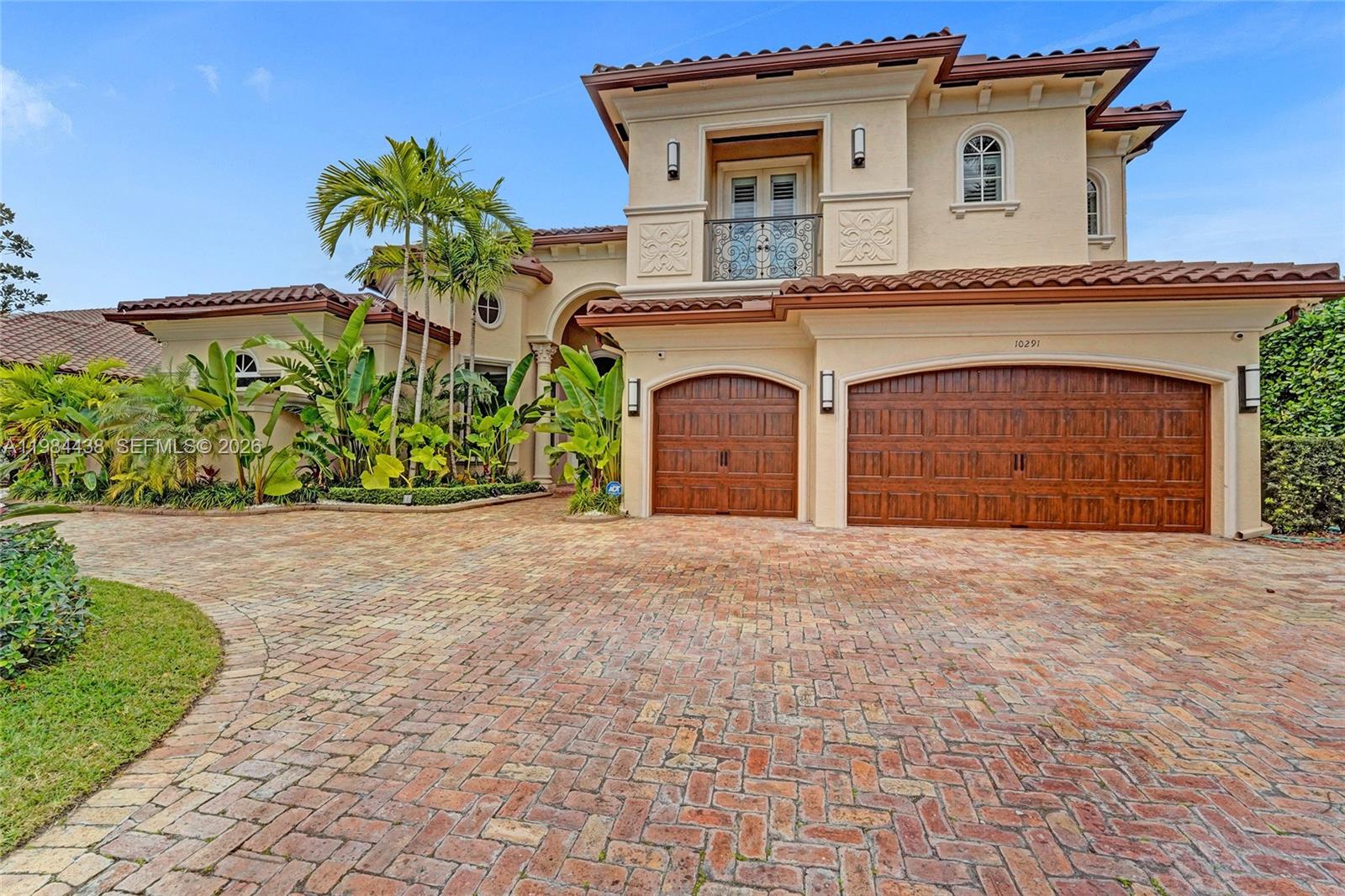 Stunning custom-built home on sought-after Sweet Bay Street in Hawks Landing with breathtaking water views! This 5-bedroom, 6.5-bath estate features a private office, loft with built-ins, impact windows, elegant marble and wood flooring. The brand-new gourmet kitchen boasts quartz countertops, a pro gas range, and stainless steel appliances. The first-floor owner’s suite offers a spa-like bath with a freestanding tub. A striking custom accent wall enhances the family room, dining room, and primary suite, with designer touches like electronic window treatments and sophisticated lighting. Outdoor living shines with a spacious marble patio, custom pool and spa, and a fully fenced yard. A circular driveway adds curb appeal. Meticulously maintained and better than new—don’t miss this rare gem!