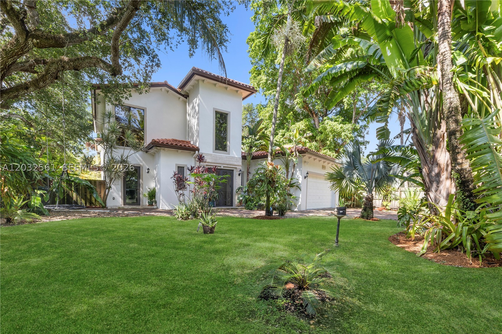 Welcome to this stunning and elegant estate, where luxury begins the moment you arrive. A spectacular courtyard pool oasis surrounded by lush exotic vegetation at the entrance of the home, creates a breathtaking first impression, offering a unique architectural design that blends sophistication, privacy, and resort style living.The property is enveloped by mature exotic vegetation, creating a serene and private oasis that feels worlds away from the everyday.This exceptional residence features 4 spacious bedrooms and 5 luxurious bathrooms, complemented by expansive living and dining areas provide ample space for family gatherings and entertaining guests, while large windows and doors invite natural light and showcase the picturesque surroundings. Exquisite marble floors throughout the home enhance the timeless elegance and refined character. A fabulous guest house offers exceptional flexibility and privacy, featuring two bedrooms and a full bathroom, making it perfect for extended family, visitors, a home office or private accommodations.From its generous spaces and sophisticated finishes to its resort style outdoor setting, this remarkable property embodies luxury, comfort, and the beauty of tropical living.A truly special home designed for those who appreciate elegance, privacy and an exceptional lifestyle.Property has solar panels install and payment is $272.92 per month in 2026