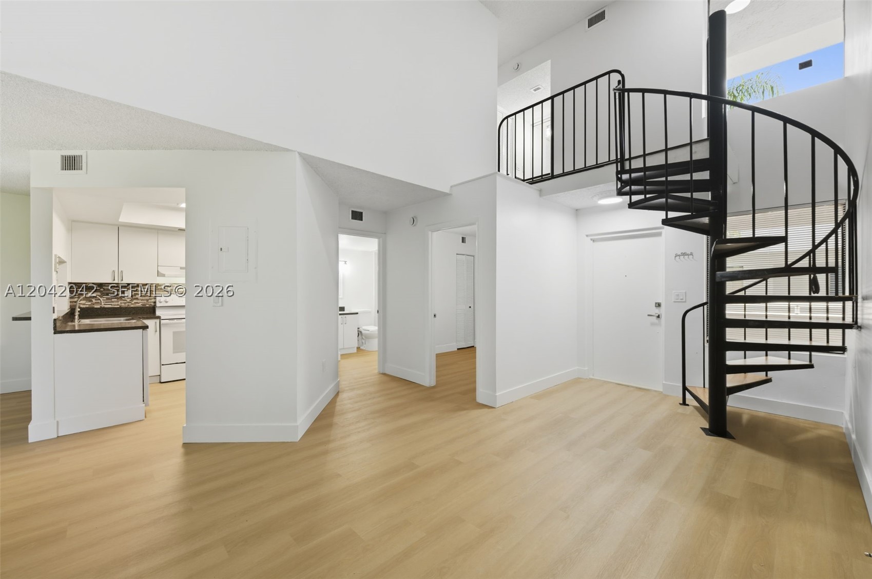 Spacious 2BD/2BA + den in the desirable gated Verabella Falls community. Features an open floor plan, abundant natural light, flexible den space, and generously sized bedrooms. Enjoy amenities including a pool, fitness center, clubhouse, and lush landscaping. Centrally located near shopping, dining, major highways, and Miami International Airport.