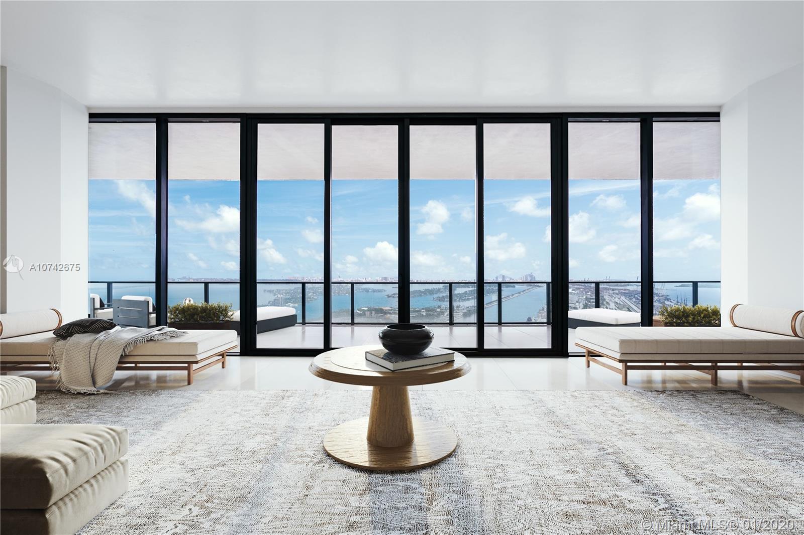 A true mansion in the sky atop One Thousand Museum, a triumphant expression of great design by legendary architect Zaha Hadid. This full-floor, 9,910 sq. ft. penthouse has impressively proportioned spaces, highlighted by 12 foot ceilings, and the 86x26 foot great room. Terraces offer arguably the most spectacular views in Miami, combining bay, city, ocean, and endless blue sky. Attention to architectural detail is meticulous. Every interior door has custom-designed handles by Ms. Hadid, and the unique engineering created sweeping interior spaces. Extraordinary amenities offer a bespoke lifestyle tailored to each resident, from the five-star spa with customized personal training to the indoor and outdoor pools, the private lounge offering aperitifs, and of course the rooftop helipad.