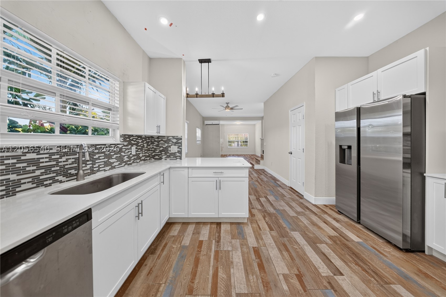 Welcome to 331 NW 1st Avenue, a beautifully remodeled and fully vacant duplex located in the heart of rapidly growing Downtown Boynton Beach. This historic gem seamlessly blends timeless character with modern upgrades, offering a rare opportunity for investors, owner-occupants, or those seeking short-term rental potential. One of the few remaining historic duplex properties in the area, this meticulously renovated residence underwent an extensive transformation that took over a year to complete.

Each side of the property features a spacious 2-bedroom, 1.5-bath townhome-style layout with separate entrances and private, fully fenced outdoor spaces. Interior upgrades include updated kitchens and bathrooms, ceramic tile and laminate flooring, central air conditioning, modern fixtures, and an abundance of natural light throughout.
Perfectly positioned east of I-95, residents are just minutes from the pristine beaches of Boynton Beach, Ocean Avenue's dining and entertainment, marinas, shopping, and major transportation routes.

With no HOA and excellent flexibility for income-producing use, this property presents an exceptional opportunity for long-term rentals, owner occupancy with supplemental income, or a unique addition to any investment portfolio. 

Whether you're looking to capitalize on Boynton Beach's continued growth or own a piece of local history, 331 NW 1st Avenue delivers charm, convenience, and endless potential.