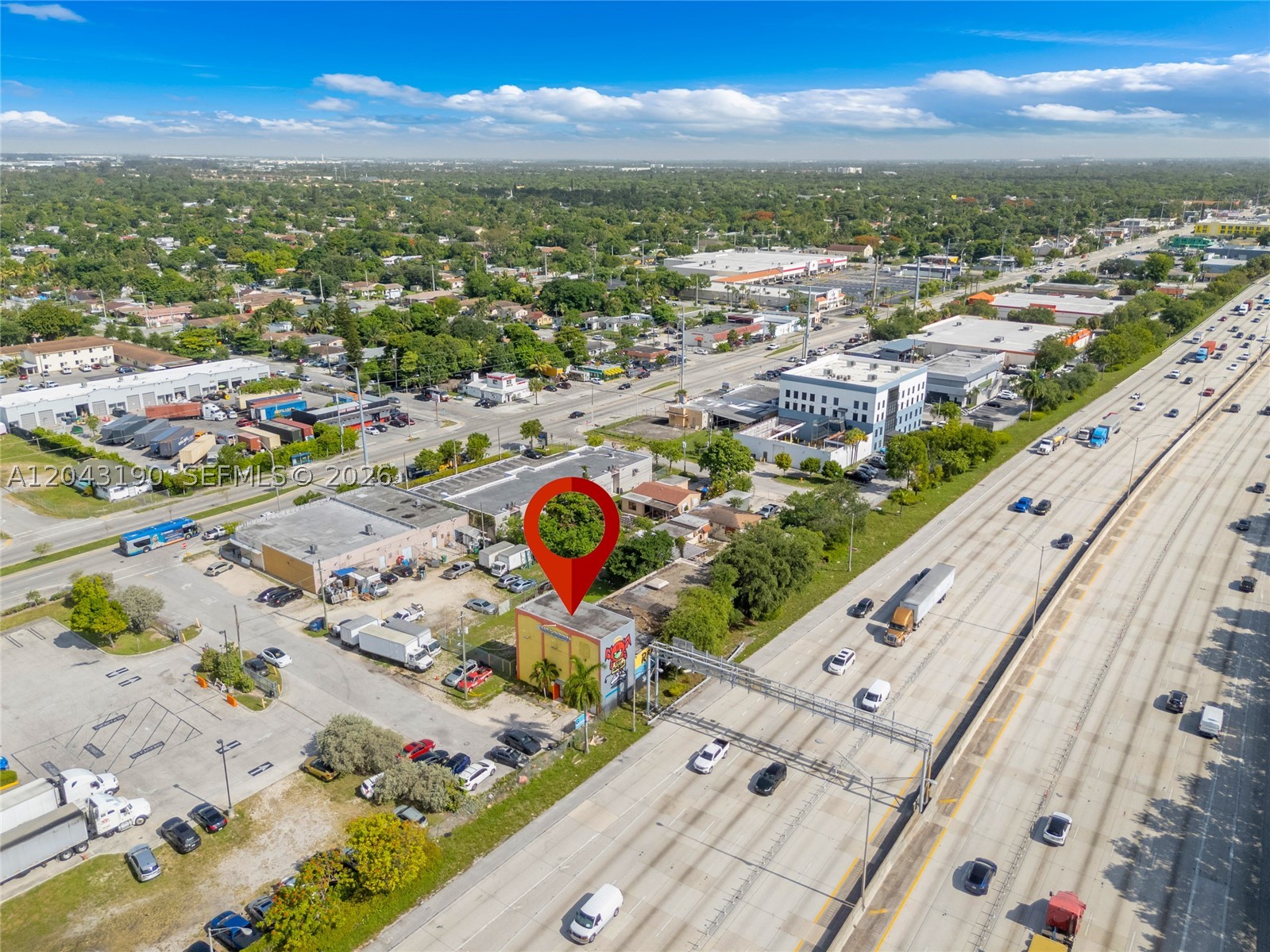 Rare free-standing industrial/flex opportunity in one of Miami-Dade's tightest, most supply-starved corridors. ±4,861 SF building on a 10,053 SF infill site with fenced yard and on-site parking. Home to the same thriving local business for roughly 50 years — a five-decade testament to the location's demand and staying power. The owner-occupant will vacate at closing, delivering the building free and clear for immediate owner-user occupancy or investor lease-up to market, with the established business also available for purchase separately for a turnkey option. Positioned on the NW 7th Avenue corridor, minutes to I-95, SR-112, Miami International Airport, and the urban core for premium last-mile access. Offered at $2,400,000 ($494/SF), below recent small-bay sales on a per-foot basis, with pro forma NNN income and a substantial land component anchoring the basis. SBA-eligible for qualified owner-users. Infill industrial land is effectively irreplaceable here.