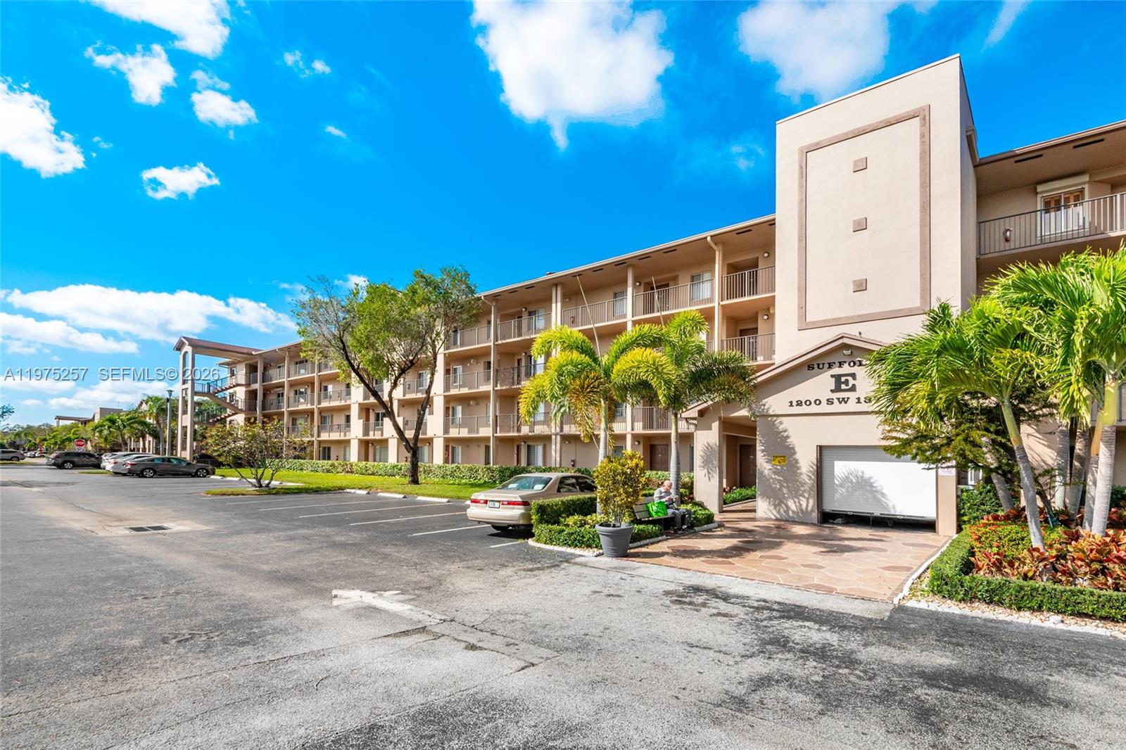 Well-maintained 2-bedroom, 2-bath “Jasmine” model offering 1,207 sq ft in the 55+ community of Century Village Pembroke Pines. Located in Suffolk E (built in 1995), the NEWEST SECTION of the community. Situated on the 4th floor of a 4-story building with ELEVATOR access.

This functional layout features an EAT-IN KITCHEN with STAINLESS STEEL appliances and high-hat lighting. Engineered wood flooring throughout with tile in the entry/foyer. Spacious primary bedroom includes a WALK-IN CLOSET and en-suite bath with WALK-IN SHOWER. WASHER & DRYER inside the unit. CENTRAL A/C. Screened patio with sliding doors and additional STORAGE CLOSET. Ample guest parking nearby.

**Building is conveniently located near the community walking path, pickleball courts (approx. 3-minute walk), tennis courts (approx. 2-minute walk), nearby houses of worship, and medical center (approx. 6-minute walk).

Monthly maintenance is $760.90 (CVP $306.90 + FirstService $454) and includes water, sewer, trash, internet, and cable. **No rentals permitted within the first 2 years of ownership**

Community amenities include clubhouse, multiple pools, fitness center, tennis courts, theater, organized activities, and courtesy transportation. Convenient access to shopping, dining, and medical facilities.

Easy to show.