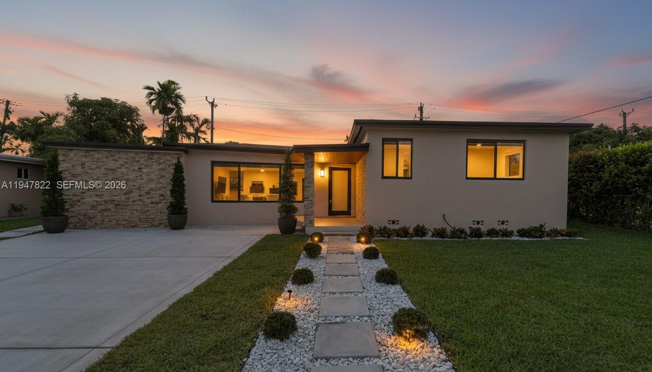 Your search ends here. This fully renovated 4-bedroom, 3-bath residence showcases a striking modern exterior with timeless mid-century influences, nestled in a desirable enclave near Miami Shores. A welcoming entry framed by minimalist landscaping and a sleek walkway sets the tone for the refined design within. A neutral color palette, clean architectural lines, and expansive windows enhance the home’s contemporary elegance while maintaining a warm, understated charm. Every inch of the home has been thoughtfully resurfaced, renovated, and reimagined to seamlessly blend indoor and outdoor living. The open-concept floor plan flows effortlessly to a lush, private backyard oasis featuring a beautiful pool—perfect for entertaining or everyday relaxation. Freshly installed hedges surround the yard and will mature to approximately 8–10 feet, providing added privacy over time. A flexible section of the home offers the potential for a private guest suite or in-law suite, adding versatility and appeal for multi-generational living or hosting visitors. Additional highlights include a 4-year-old roof, hurricane impact windows, and no HOA. This is refined living at an exceptional value. Schedule your private showing today and begin the next chapter in this exceptional home.