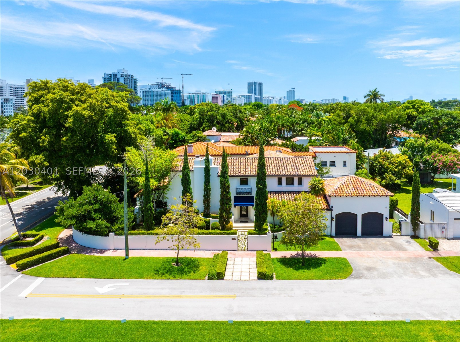 Beautiful Mediterranean villa sited on a prime corner lot on prestigious Pine Tree Drive, moments to La Gorce Country Club. Walled and gated, the 4,600-SF home welcomes you with an enchanting courtyard with a fountain surrounded with perfectly manicured landscape. The expansive living spaces are designed for grand entertaining and feature a centerpiece, oversized chef’s kitchen connecting to a living room with fireplace and formal dining room, media room, and an entertainment room with a bar. Features include hurricane impact windows, high ceilings, original terracotta floors, Sonos sound system, and full house generator. Primary suite features two walk-in closets and terrace, backyard with heated pool and covered patio for outdoor dining and relaxation. Offering secluded luxury lifestyle on tree-lined Pine Tree Drive, this home is located near golfing, beach, Bayshore Park, South Beach dining and entertaining, Miami’s Design District, and Bal Harbour Shops.