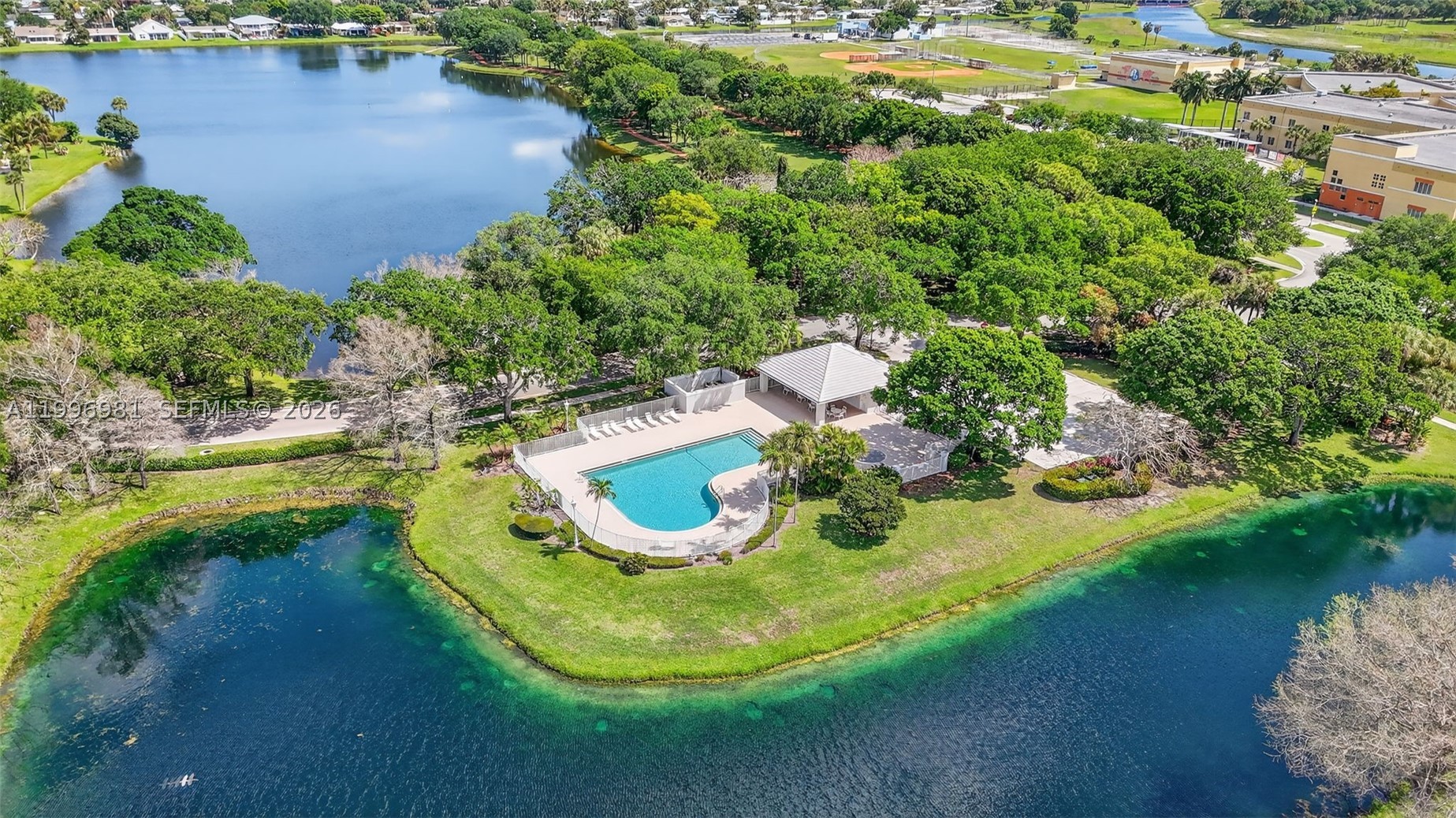The perfect place to call home in the Sunshine State! Come fall in love with this move-in-ready villa. Nestled in a peaceful corner of Lake Catherine, this home feels immediately expansive thanks to soaring ceilings and an open-concept layout that flows seamlessly from one space to the next. 
Modern wood-look tile floors flow throughout the interior. The thoughtful split floorplan ensures maximum privacy, while impact-rated sliding glass doors in every room invite you out to a spacious, screened lanai—the perfect spot for morning coffee or evening breezes. This home offers an extra layer of seclusion with no neighbors directly across from you.

Practicality meets peace of mind here: the property is free of polybutylene pipes, and the monthly association fee covers the community pool, roof repairs, and exterior insurance, allowing for a truly low-maintenance lifestyle. The location is just as impressive as the home itself. You’ll be minutes away from a variety of local parks, dining favorites, and shopping. Commuting is a breeze with quick access to I-95, and when the weekend hits, the beach is just a short drive away. This villa offers the perfect blend of style, comfort, and convenience.