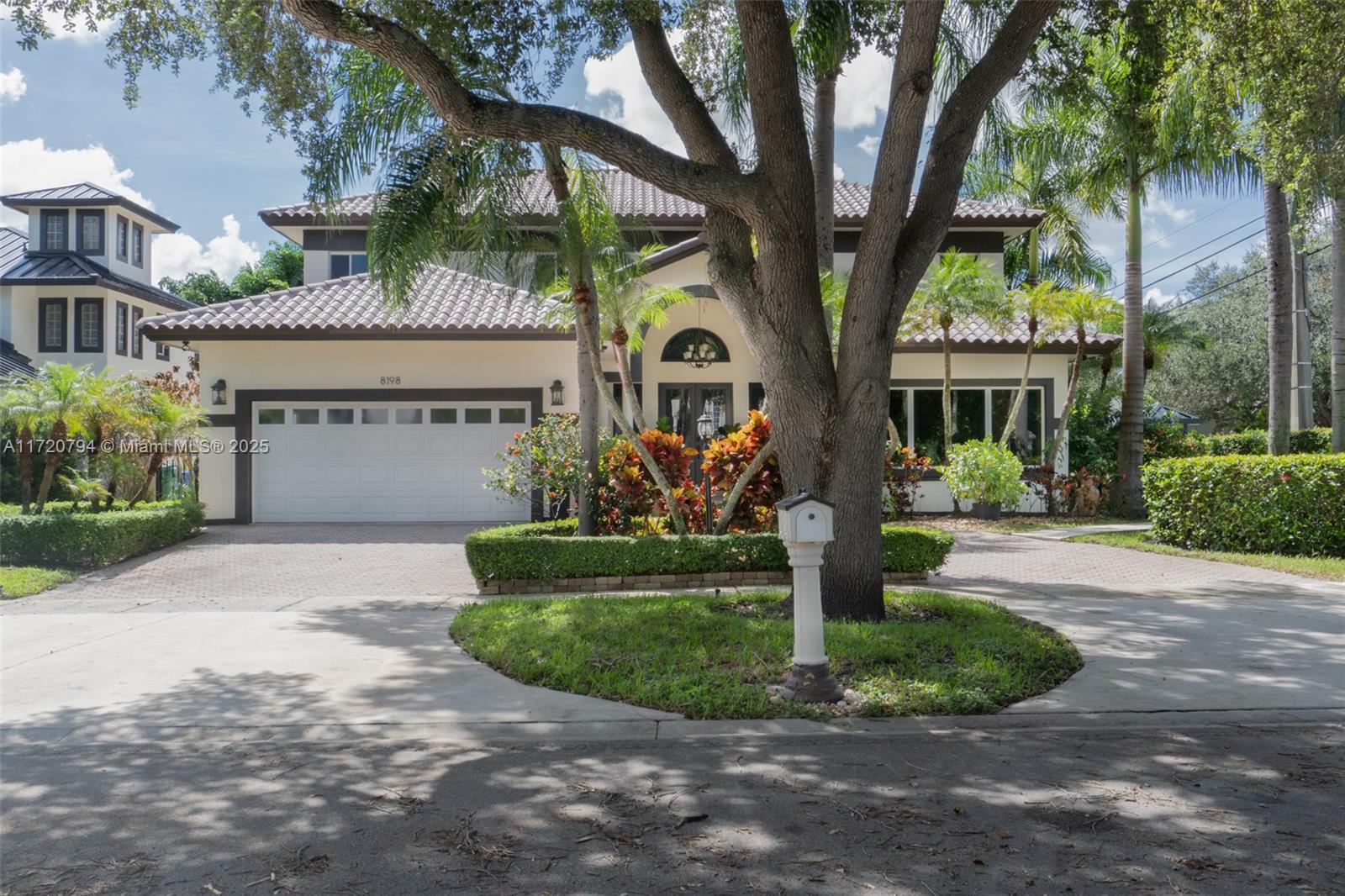 This impressive home located in the prestigious Royal Oaks neighborhood of Miami Lakes features a brand-new roof, a concrete second floor, and impact windows throughout for added protection. Set on a corner lot at a quiet dead-end, it offers peace and privacy. Inside, the home boasts beautiful porcelain flooring, including stunning marble stairs, adding elegance to every step. The private backyard features a beautiful pool, perfect for relaxation and entertaining. With its thoughtful upgrades and prime location, this property offers both style and security in a tranquil setting.
