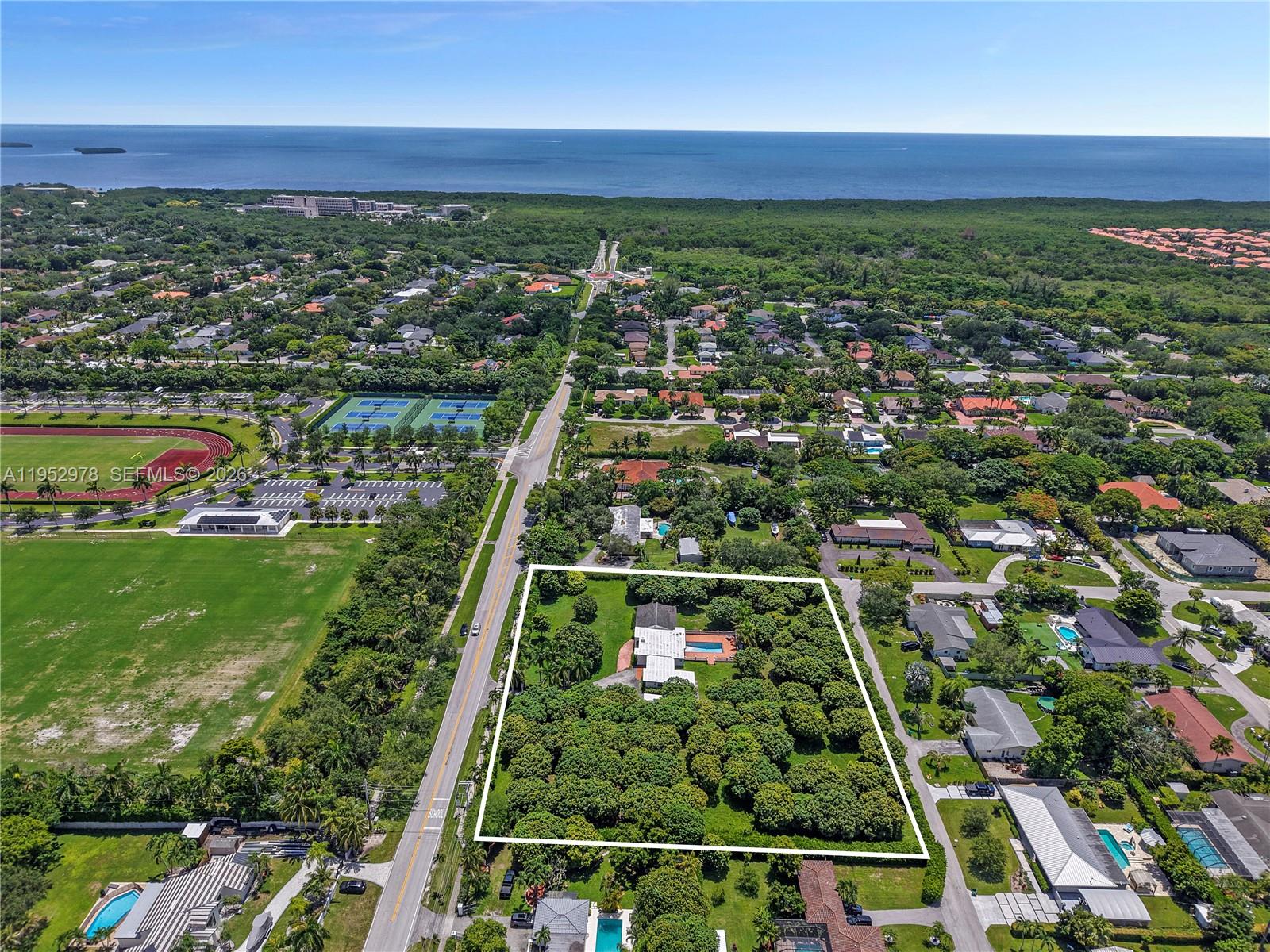 Development opportunity in Cutler Bay next to Palmer Trinity Private School.  This 2.28-
acre property, just off scenic Old Cutler Rd, offers endless potential — build, develop, or enjoy as-is. Close to Black
Point Marina, The Falls, Southland Mall, Deering Bay Estate, parks, and US-1 for easy access to Miami and the
Keys. The lush lot, filled with mango trees, includes a 4-bed, 2-bath, plus office/flex room, 2,635 SF home, ready for your vision. Has 2 entrances, one on SW 184 St and SW 184 Ln. Large parcels like this in such a prime location are hard to find.