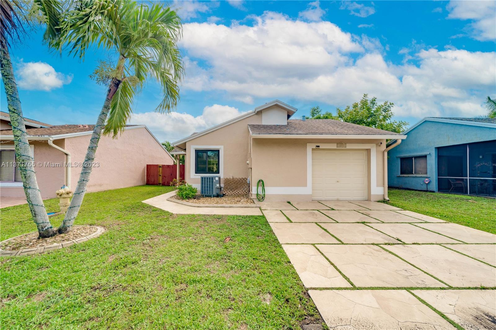 Elegance surrounds you & nothing has been overlooked: Features include: Impact windows, except French doors; wood kitchen cabinets and appliances, granite counters, updated bathrooms. The home comes with a full water filtration system through out the home and also for drinking water. System has cost $10,000.00 and it is paid for it. Centrally located near A rated schools, shopping, restaurants, beaches & highways. For buyers with high expectations