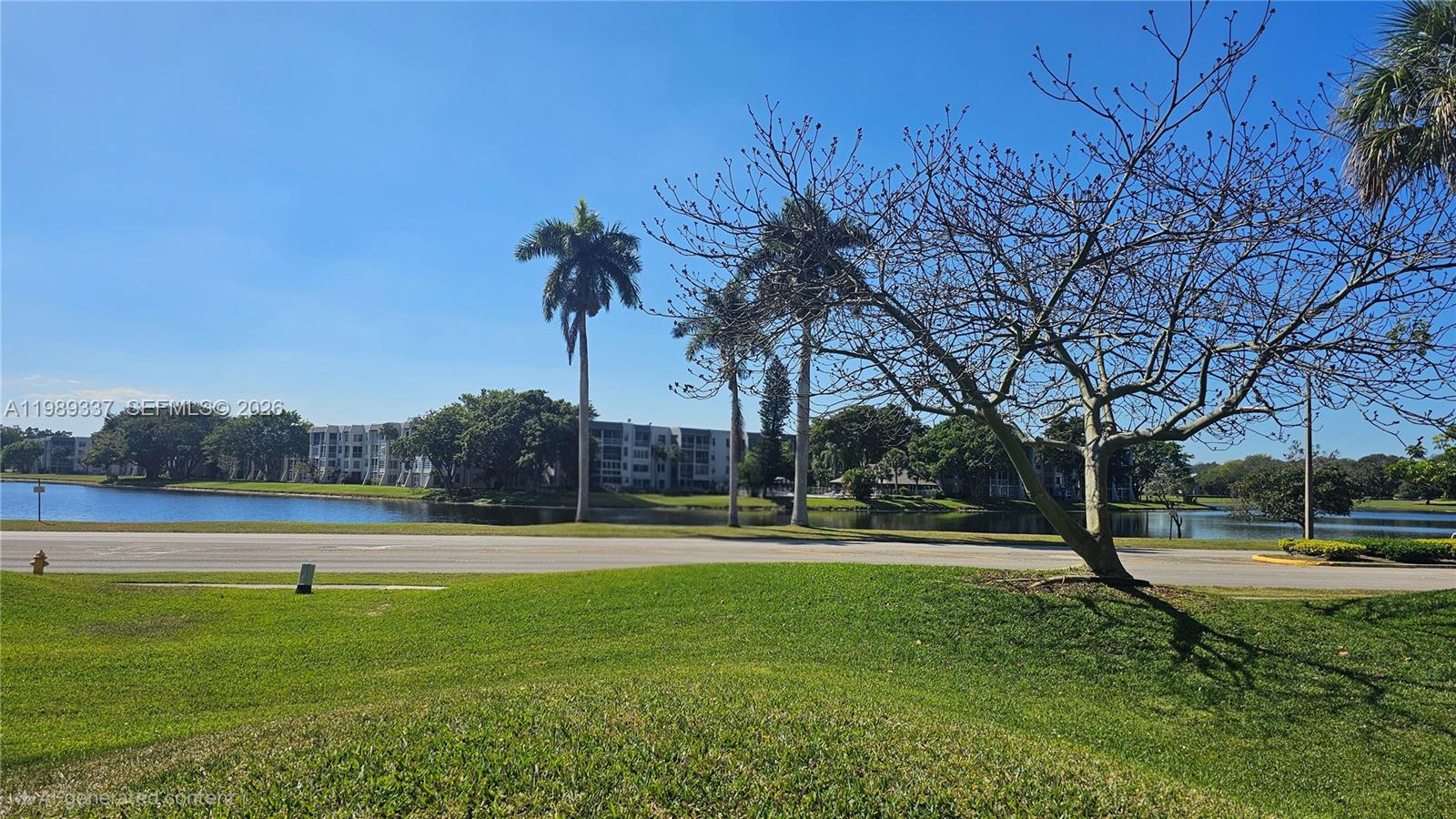 Beautiful first-floor corner unit located in desirable Pine Ridge! This bright and spacious 2 bedroom, 2 bath condo features a remodeled kitchen, fresh interior paint, and a versatile additional space perfect for a home office or flex area. High impact windows for hurricane protection. Enjoy a screened-in balcony ideal for relaxing, plus the convenience of parking located just steps from the unit. Light-filled, well-maintained, and move in ready. Pine Ridge offers an exceptional lifestyle clubhouse, on-site restaurant, pool, exercise room, 18-hole golf course and a variety of social activities.This one is a must see!