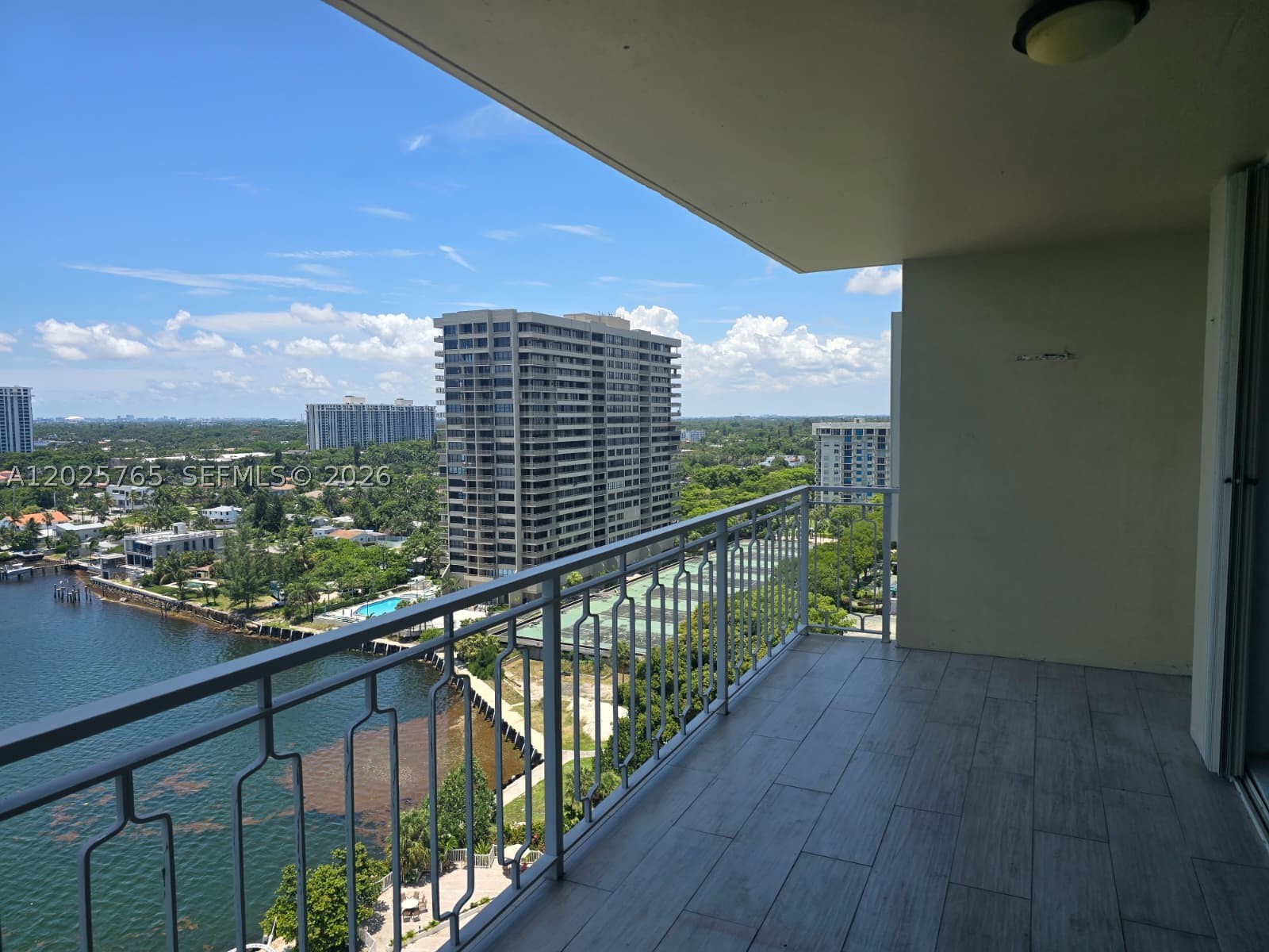 Beautiful views with this 2 bed 2 bath unit, waterfront serene living. Laundry on every floor, 2 parking spaces & ample guest parking. Located in a prestigious & gated waterfront Jockey Club Community, residents enjoy resort-style amenities including a waterfront pool, concierge services, & 24-hour security. The location of the condo offers easy access to the city's best dining, shopping, & entertainment destinations. Please see broker remarks for other info