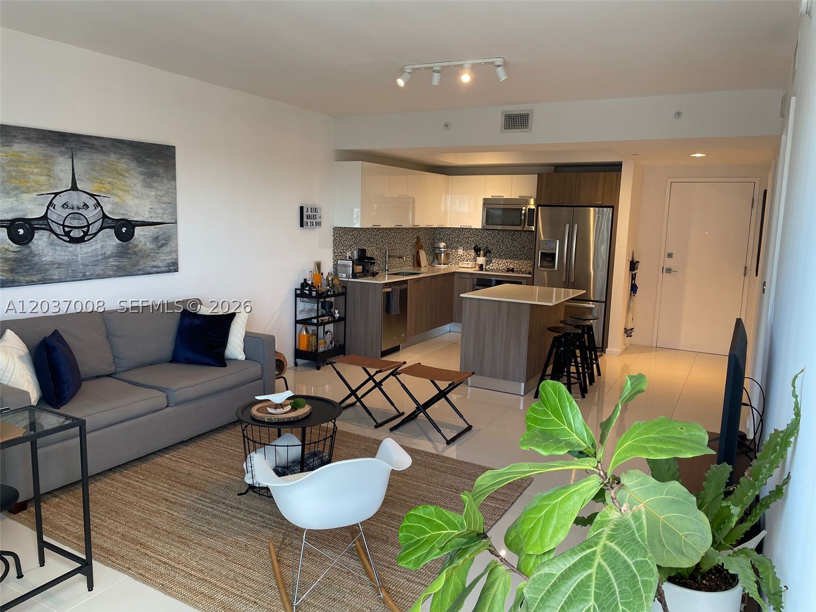 Experience upscale urban living in the heart of Downtown Doral! This beautiful and modern 1-bedroom, 1-bath apartment features an open-concept floor plan with elegant Italian porcelain flooring, abundant natural light, and stylish finishes throughout. The contemporary kitchen is equipped with stainless steel appliances, while the spacious bedroom offers two custom-made closets and blackout shades for added comfort and privacy. Enjoy the convenience of an in-unit washer and dryer.
Residents have access to outstanding resort-style amenities, including a sparkling pool, fully equipped fitness center, and children's play area. Ideally located within walking distance to Publix, restaurants, shops, parks, and everything Downtown Doral has to offer, this condo provides the perfect blend of comfort, convenience, and lifestyle.
Rent includes basic cable, internet, and water. Association approval required; minimum FICO score of 649. Don't miss this opportunity to live in one of Doral's most desirable communities! Call to schedule your showing.