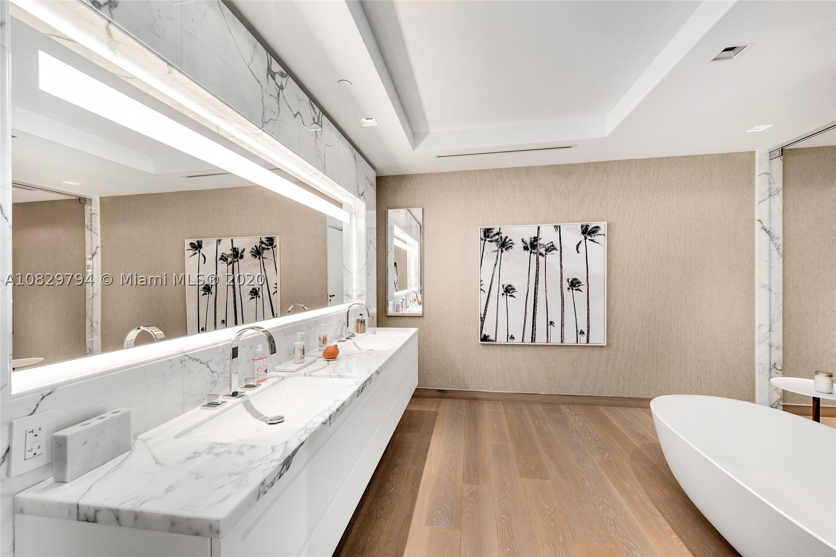This turnkey, fully furnished designer unit by Henge at Palazzo Del Sol, the new luxury building on Fisher is stunning. No expense spared. This unit features 3,793 SF, private elevator entry, oak floors throughout, custom wallpapers, lighting, millwork & built-ins. Spacious open flow-thru layout w/extended living, family & dining areas with amazing views to Govt. Cut, city & Ocean. The chic gourmet Boffi kitchen sports top-of-the-line Gaggenau appliances & exotic stone counter tops/backsplash. A private principal suite offers direct terrace access & water views, & Book-Matched Statuario marble bath with walk-in glass-marble rain shower & sunken oval tub. The other 2 bedrooms w/en-suite baths & a shared terrace w/views to Fisher Island & Miami skyline. 5-Star Palazzo Del Sol amenities.