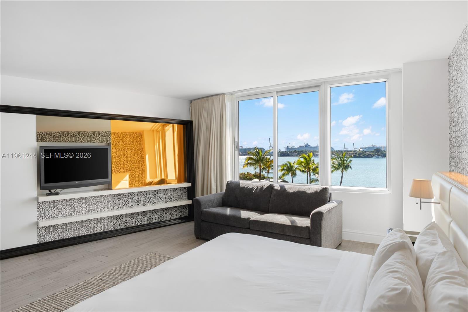Stunning bayfront residence at the iconic Mondrian South Beach Condo-Hotel, perfectly situated on West Avenue in the heart of Miami Beach. Enjoy breathtaking, unobstructed views of Star Island, Biscayne Bay, the Miami Downtown skyline, and the cruise ships as they arrive and depart from the Port of Miami—an ever-changing waterfront backdrop day and night.
This sought-after condo-hotel offers resort-style living with full service amenities, including a waterfront pool, spa, fitness center, restaurant, and 24-hour concierge. Ideal as a primary residence, vacation retreat, or income-producing property with flexible rental options. Just minutes to South Beach, Sunset Harbour, dining, shopping, and nightlife. Experience the best of Miami Beach living with postcard-perfect views. Unit is currently in the hotel program.