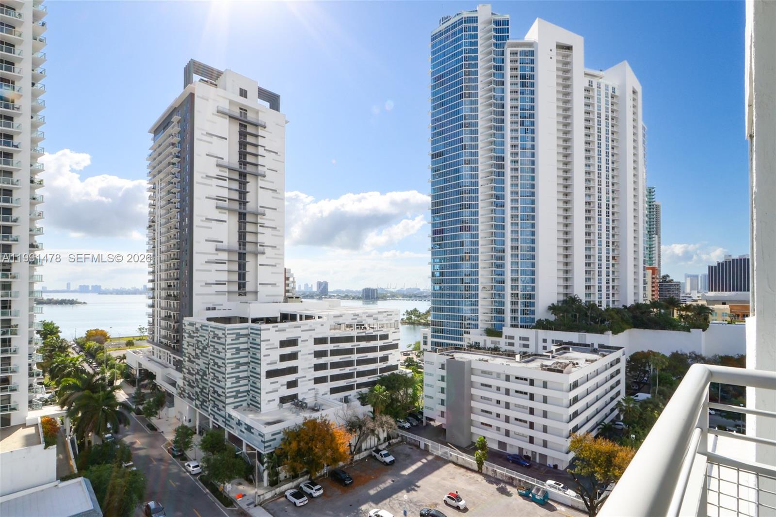 2/2 apartment with balcony and stunning partial bay views! Higher than normal ceilings in a loft concept featuring 2 bedrooms, 2 baths (master one en-suite with bathtub). Kitchen with granite counters and stainless steel appliances, W&D in unit, balcony with amazing bay views. Building has a nice pool with pool deck and Jacuzzi, sauna room and gym. Close to Omni, Downtown, Wynwood and Midtown. Ok Corporate buyers. Rent right away twice a year. Pets allowed w/restrictions. Unbeatable location with free street parking. Your lender will love: Maintenance fee includes current collection of reserves (SIRS + Regular) to avoid future special assessments.