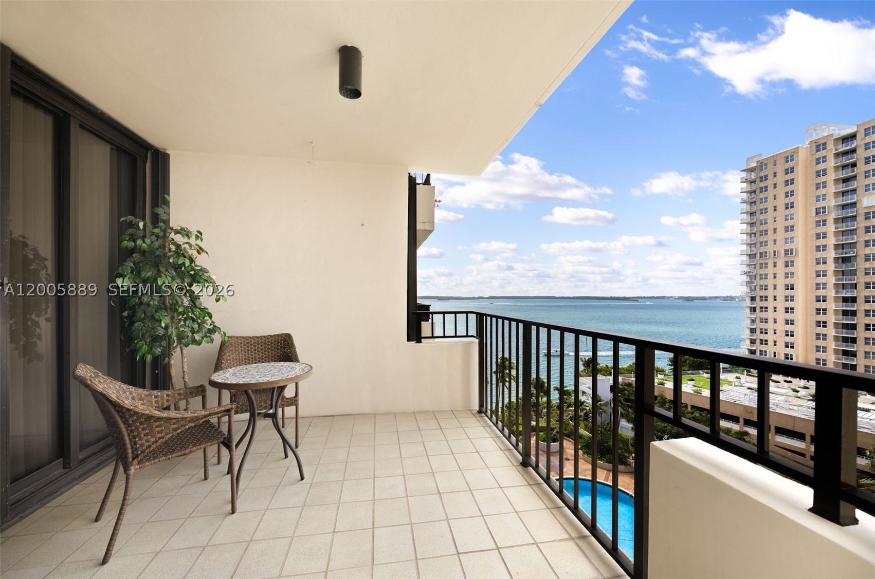 High-floor 1-bedroom, 1.5-bath residence at Brickell Key One with sought-after southeast exposure and unobstructed bay views. Owned by the same resident for over 30 years and lightly used seasonally, this 724 SF home has been carefully maintained in original condition, offering an ideal canvas for renovation and personalization. The spacious waterfront terrace enhances indoor-outdoor living with direct bay views.

Residents enjoy expansive amenities including tennis courts and a bayfront pool within a full-service waterfront tower on exclusive Brickell Key in Miami. Includes assigned covered parking, complimentary valet for guests, and private storage.

Enjoy gated island living on Brickell Key, a quiet residential enclave offering a rare blend of privacy and walkability with waterfront paths, boutique dining, and everyday conveniences just moments from Brickell’s financial district.