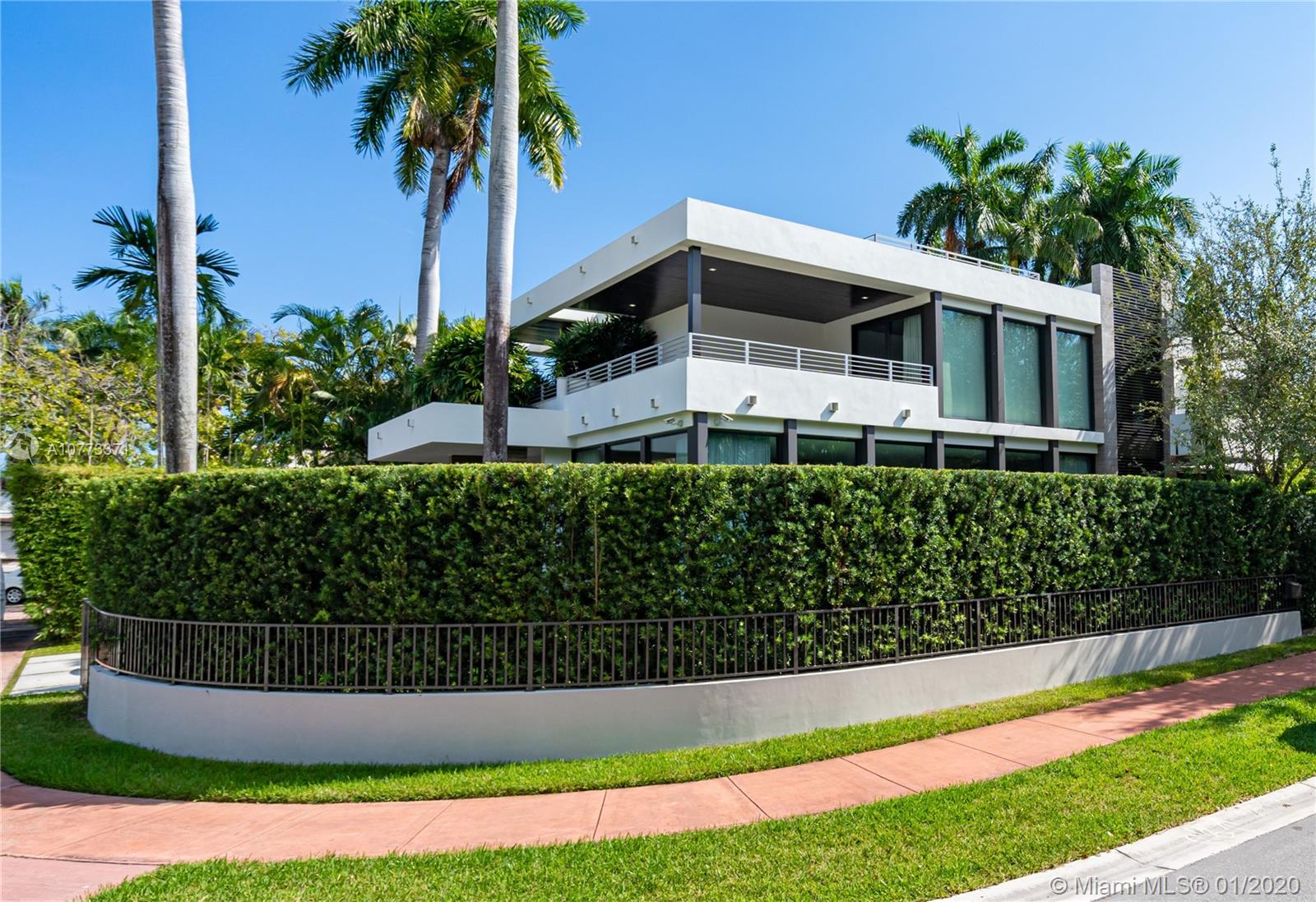 At the core of this 4,000 sq.ft. Venetian Island home is an elegant and spacious kitchen that connects to a light filled family room with rear terrace and pool. Located on a 7,500 sq. ft. lot, this 5-bed house includes formal living and dining rooms, 2 master baths, 5 extra full baths complete with Italian vanities, French Oak wood floors and Ghizzi & Benatti interior doors. The modern Italian kitchen is enhanced with topnotch Sub-Zero & Wolf appliances, premium Rohl and Kohler plumbing fixtures, and contemporary Record E cucine cabinetry. A deluxe rooftop terrace offers magnificent views of Biscayne Bay. The home is outfitted with CGI hurricane impact-resistant windows, doors, and a fully integrated Control 4 automation system. California closets and electric shades throughout.