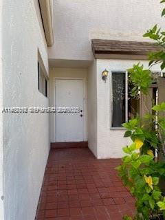 CAN'T MISS THIS OPPORTUNITY!!! Beautiful Town house in the heart of Plantation, 3 bedrooms and 2.5 Bathrooms, all tiled first floor, carpet on second floor, very spacious, very bright with large sliding doors in the living room, nice kitchen with space for a daily dinning table, washer and Dryer on first floor, garage for one car, Roof is new 4 years, A/C is 4 years old, very quiet neighborhood, 650 Credit score by association, Close to shopping Center, New Mall 3 blocks away, BUYER WILL PAY THE ASSESMENT!!!! IS TENANT OCCUPIED, MONTH TO MONTH. Assesment is $700 a month for 14 years and the HOA $750 a month.