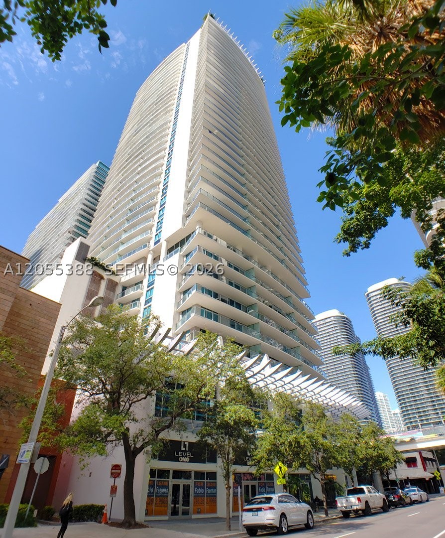 Live in the heart of Brickell! Bright and modern studio at Millecento featuring floor-to-ceiling impact glass, abundant natural light, an open-concept layout that maximizes every square foot, and a spacious private balcony overlooking the pool and surrounding cityscape. The contemporary kitchen showcases sleek cabinetry, an integrated refrigerator, stone countertops, and stainless steel appliances. Residents enjoy exceptional building amenities, including two swimming pools, a spa, a state-of-the-art fitness center, a theater room, a club lounge, valet parking, and 24-hour security. Ideally located just steps from Brickell City Centre, Mary Brickell Village, restaurants, cafés, shopping, entertainment, Metrorail, Metromover, and major highways. Basic internet service, water, and sewer are included in the rent. A perfect blend of style, comfort, convenience, and vibrant Brickell living.