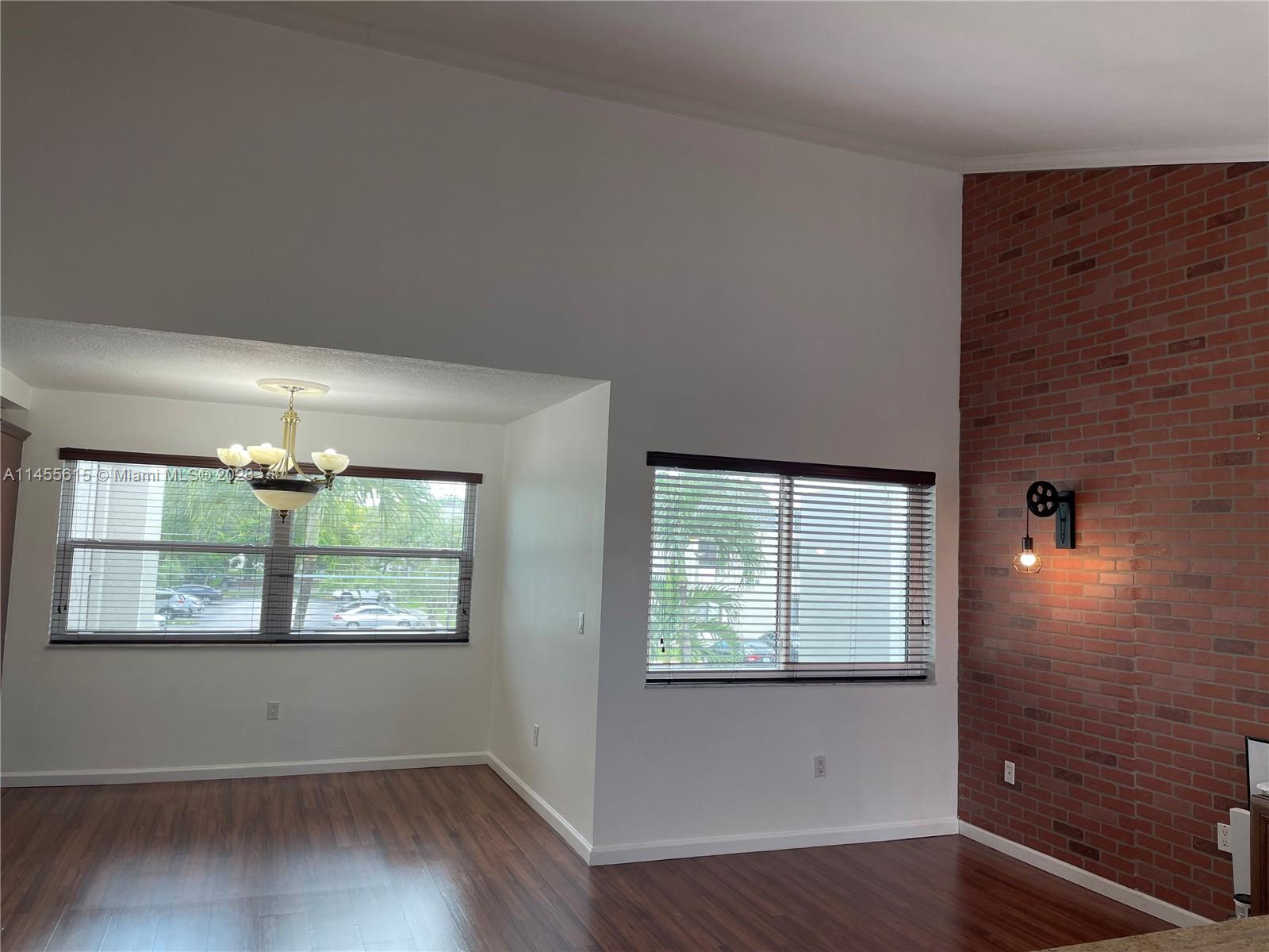 Don’t miss this great opportunity on renting a very cozy townhouse extremely  spacious two bedroom, two bathroom located close to DORAL. Wood floors, updated kitchen with stainless steel appliances, washer and dryer in unit and enclosed small patio. Pool and tennis court in the community. Centrally located close to Publix supermarket,Target, Dolphin Mall  and International Mall and 10 mins away from the airport.