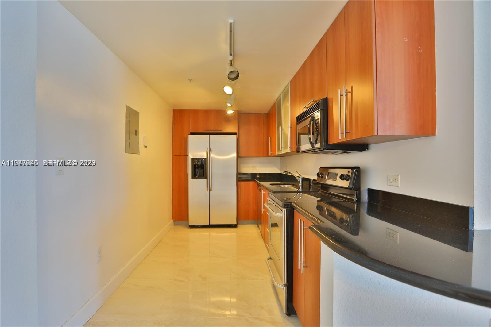 Large and bright 2 bedroom /2 bathroom in a bay front building in North Bay Village! Great views to the bay from the large balcony, beautiful porcelanata flooring throughout, updated bathrooms, updated kitchen with stainless steel appliances, granite counters, updated cabinets, unit in excellent move in condition. Building has access to 3 great pools, a modern gym and beautiful walk way along the bay! Very well located 10 minutes from the beach with easy access to mainland Miami. This is a great investment opportunity that can be a great primary residence, rental property or vacation condo. Call to schedule your private tour.
